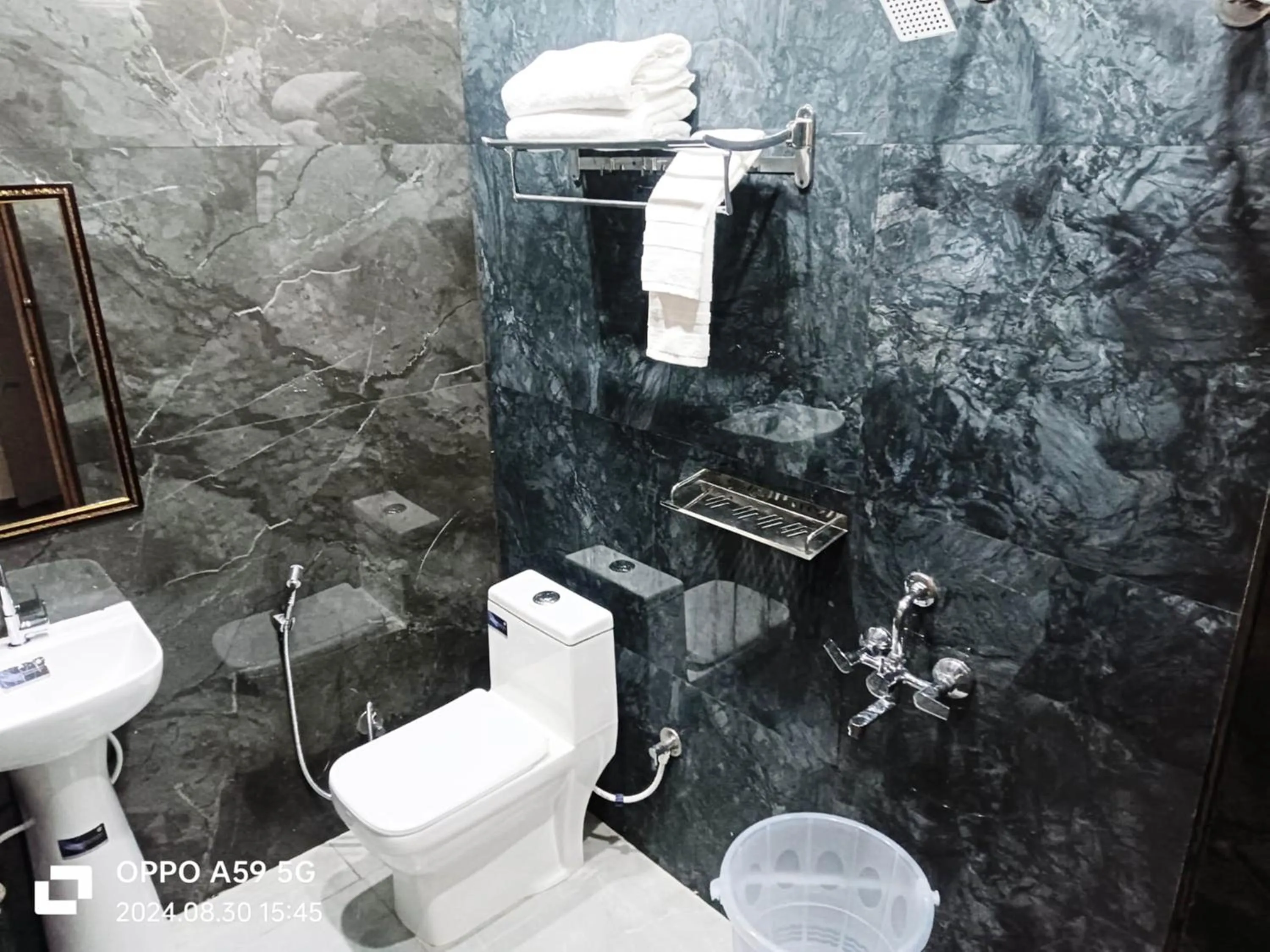 towels in ShriGo Hotel Pushpa Residency