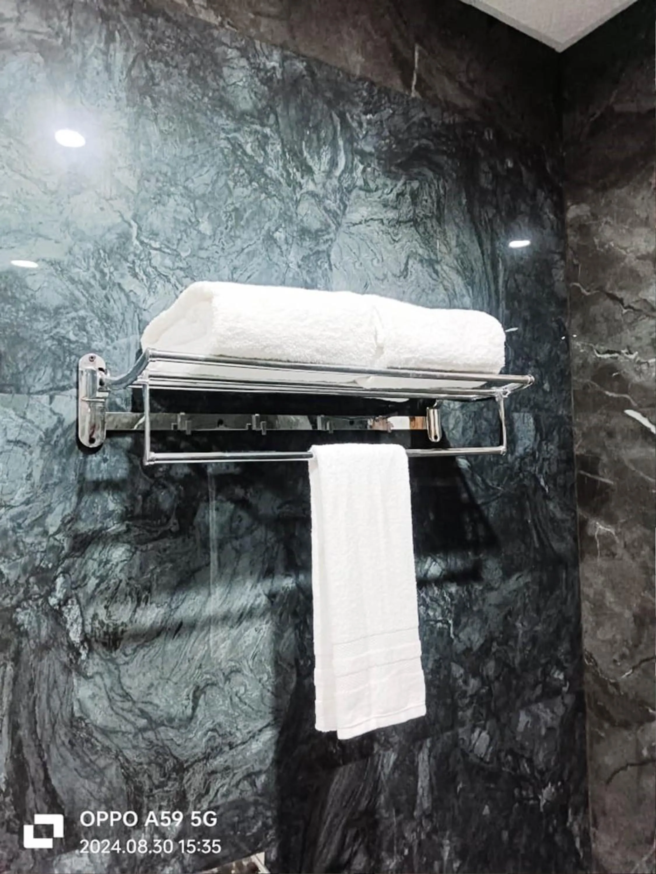 towels in ShriGo Hotel Pushpa Residency