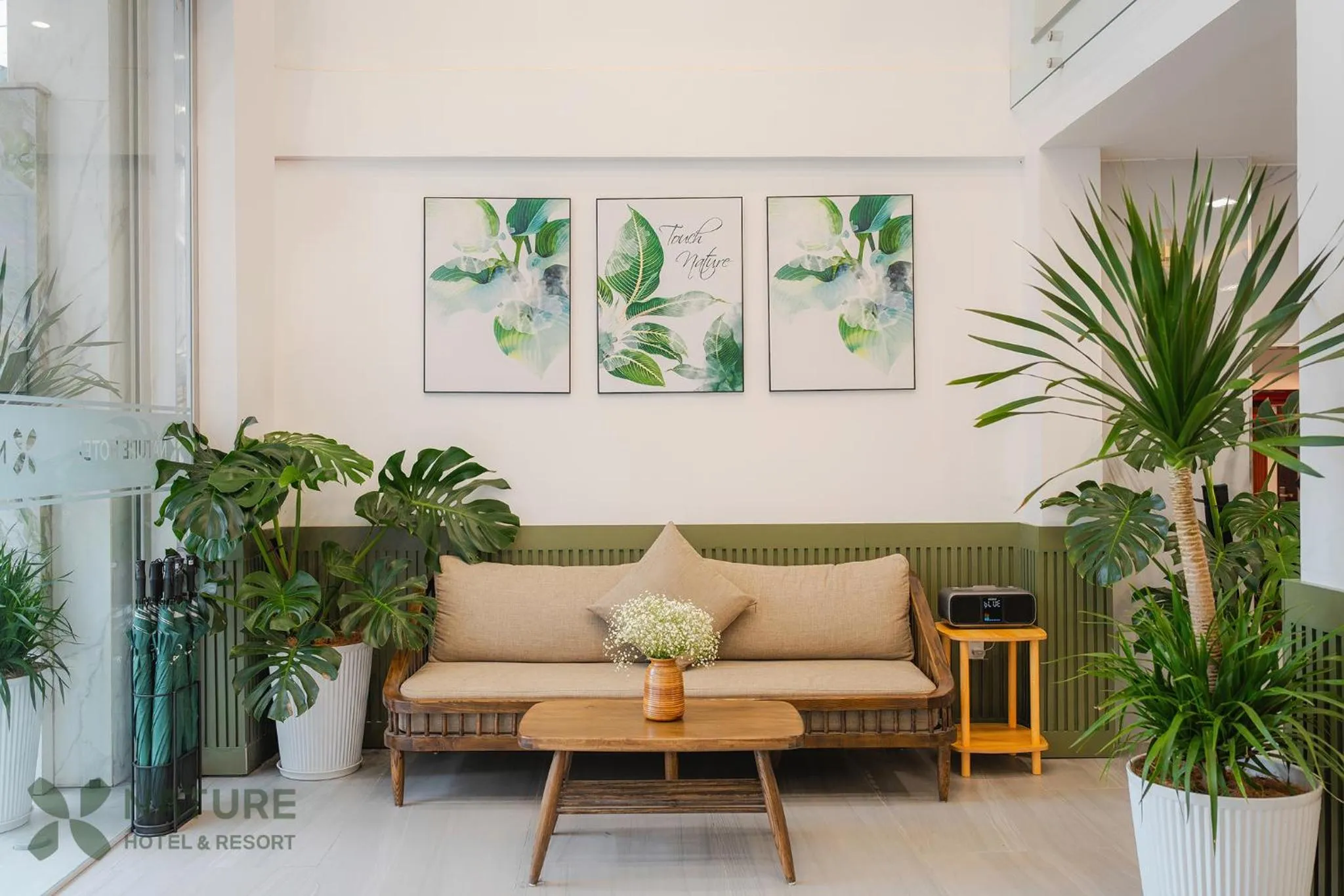 Communal lounge/ TV room in Nature Hotel - Nam Ky Khoi Nghia