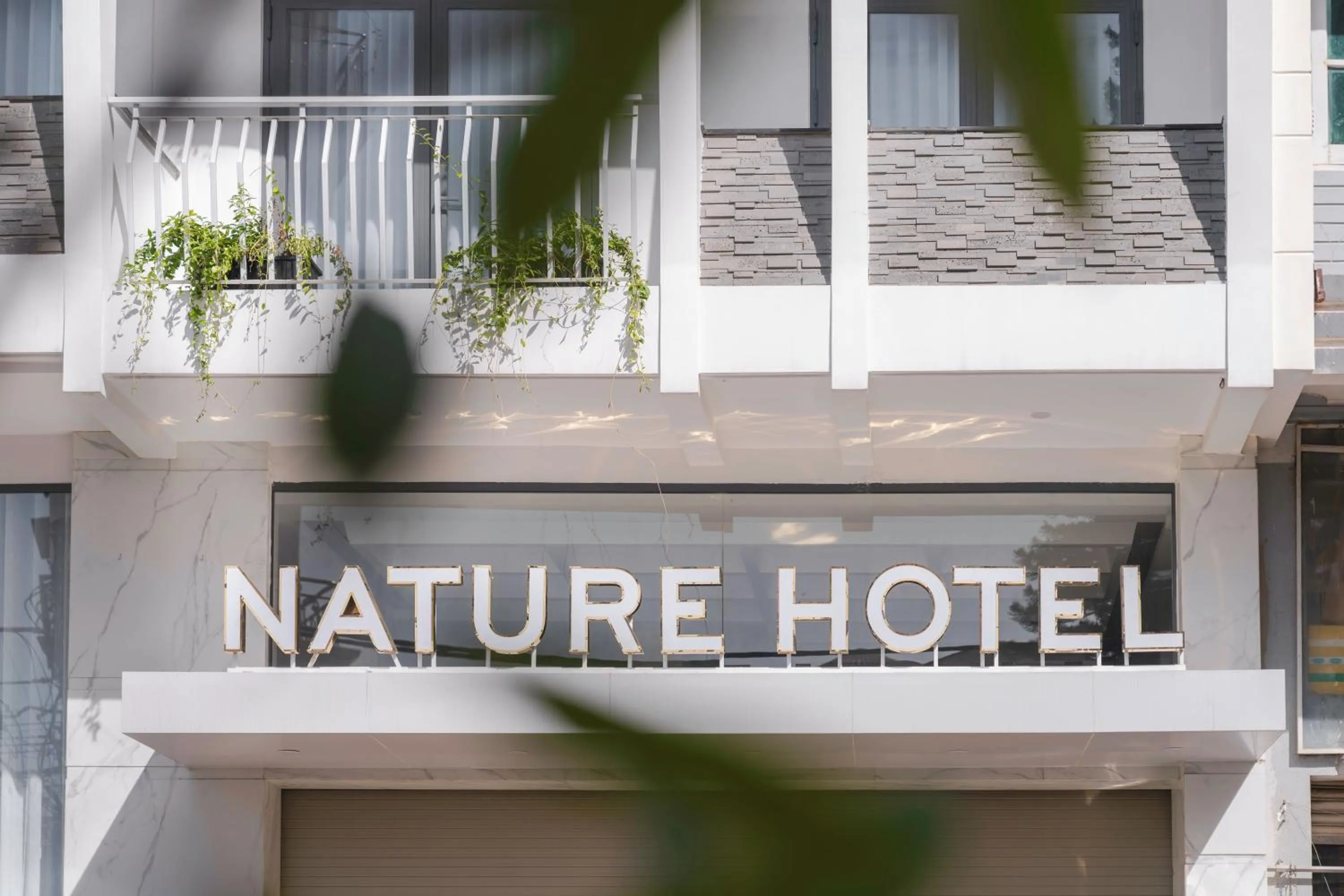 Logo/Certificate/Sign in Nature Hotel - Nam Ky Khoi Nghia