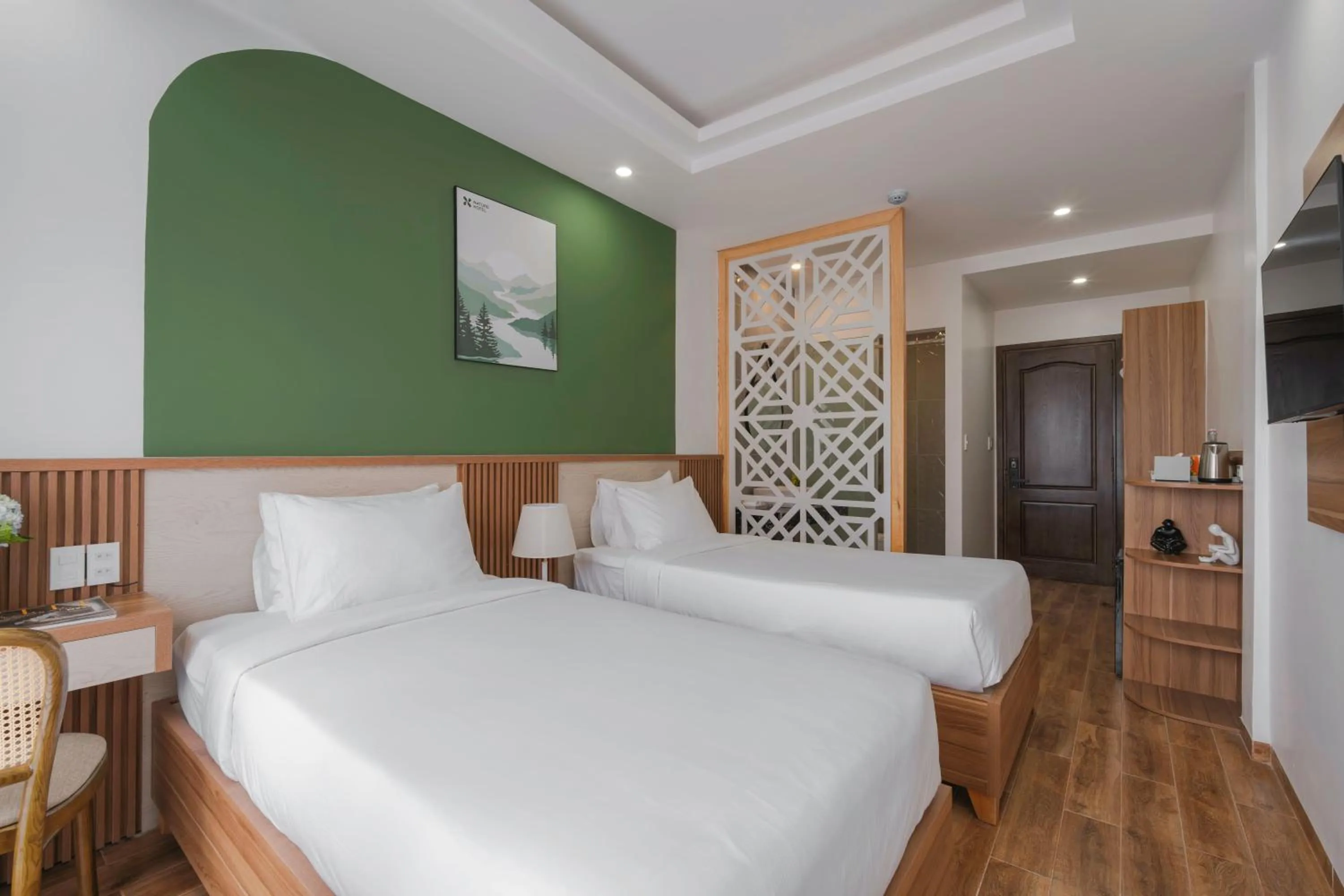 Photo of the whole room, Bed in Nature Hotel - Nam Ky Khoi Nghia
