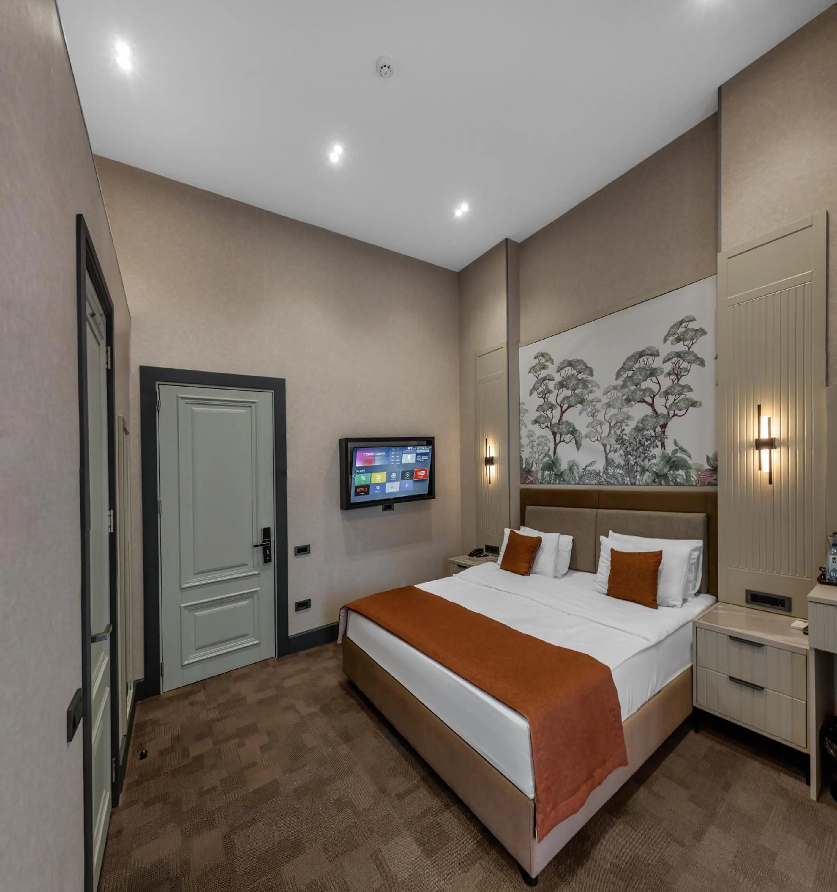 Bed in Nizami Central Park Hotel