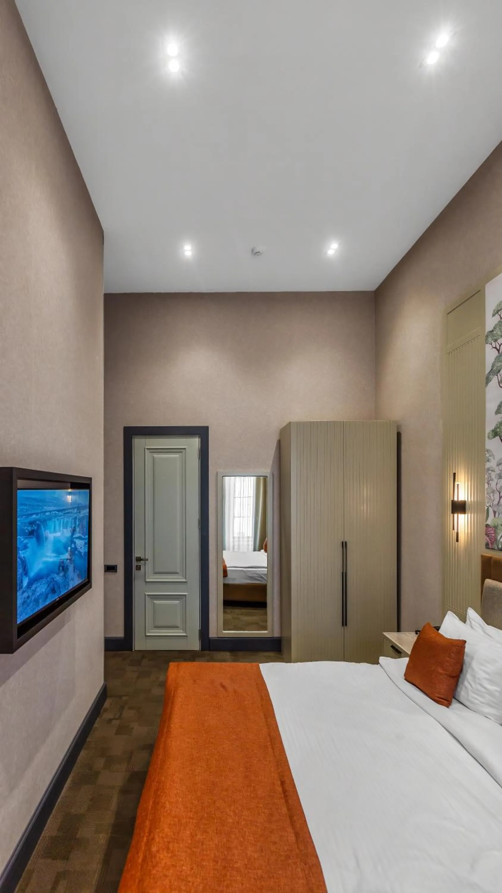 Bed in Nizami Central Park Hotel