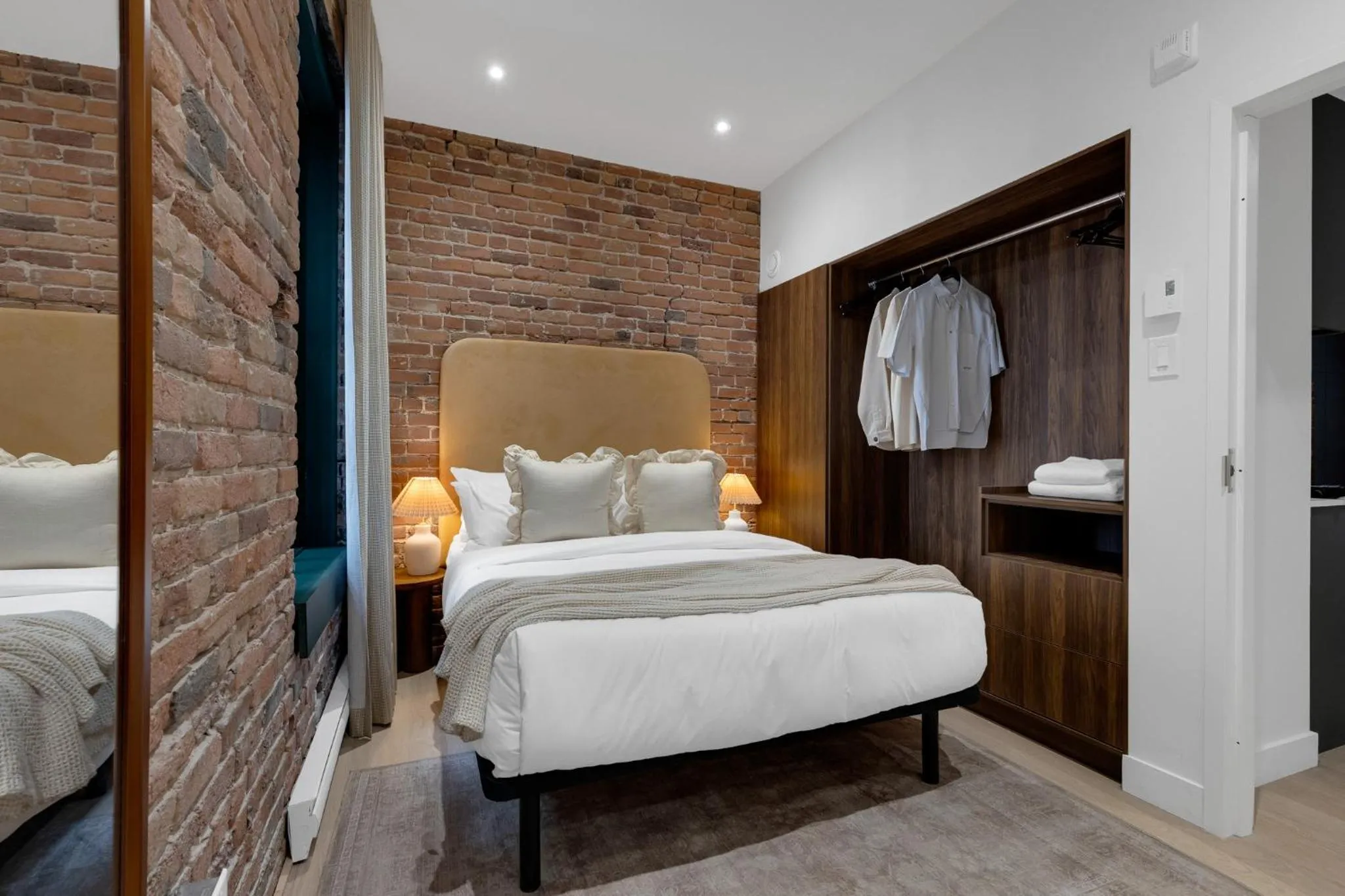 Bed in The Mercer Boutique Hotel