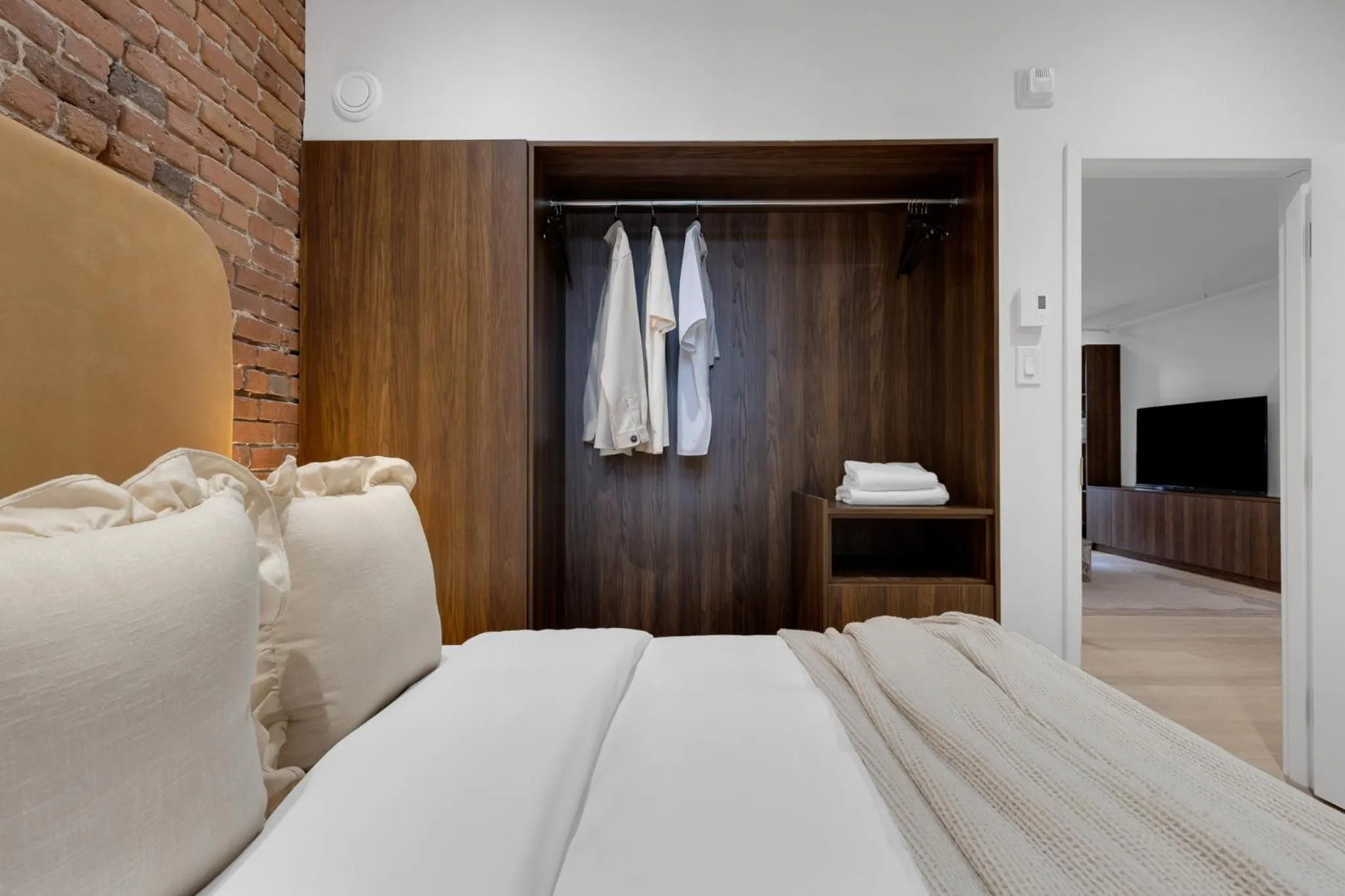 Bed in The Mercer Boutique Hotel