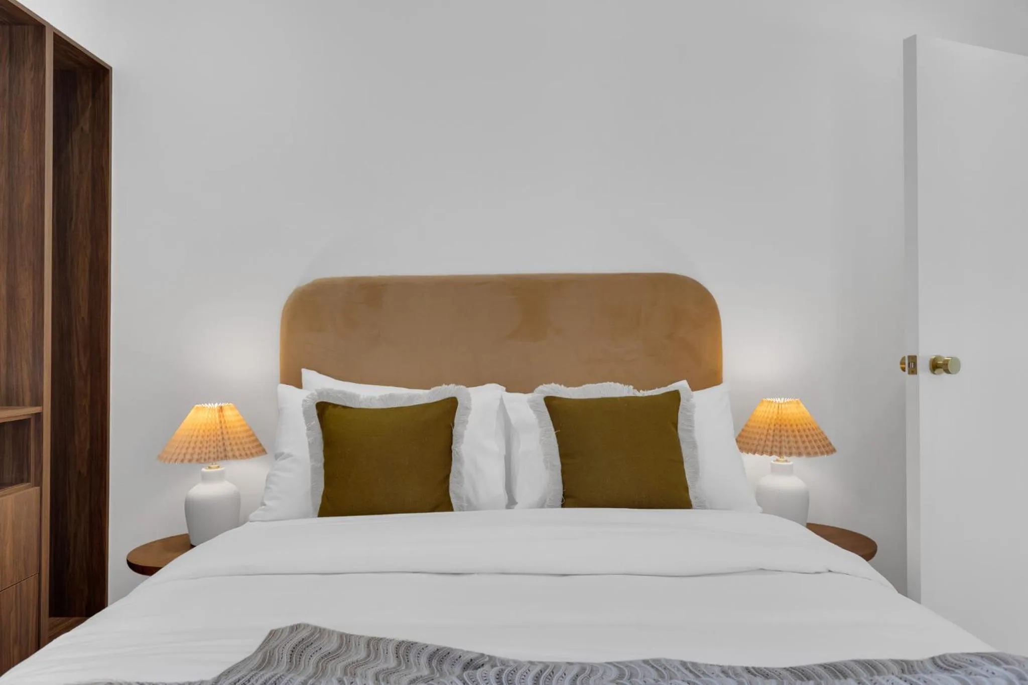 Bed in The Mercer Boutique Hotel