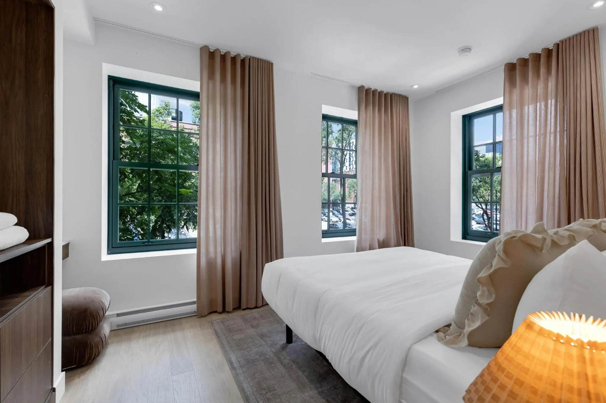 Bed in The Mercer Boutique Hotel