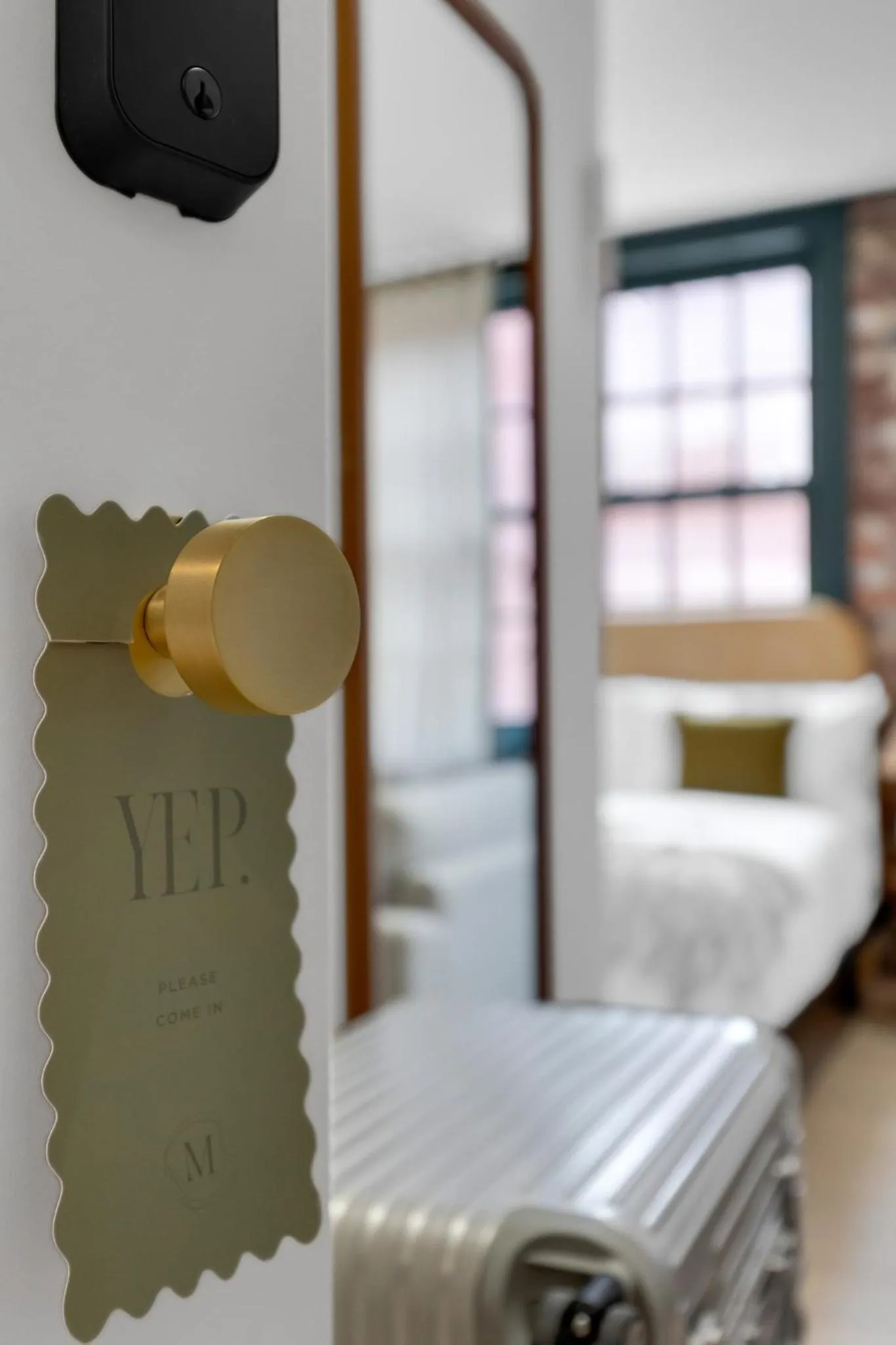 Bed in The Mercer Boutique Hotel