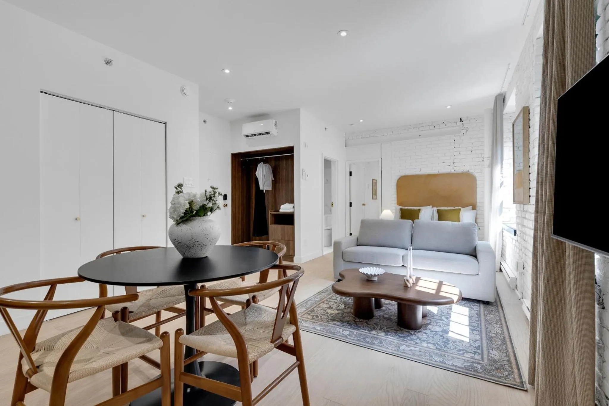 Bed in The Mercer Boutique Hotel