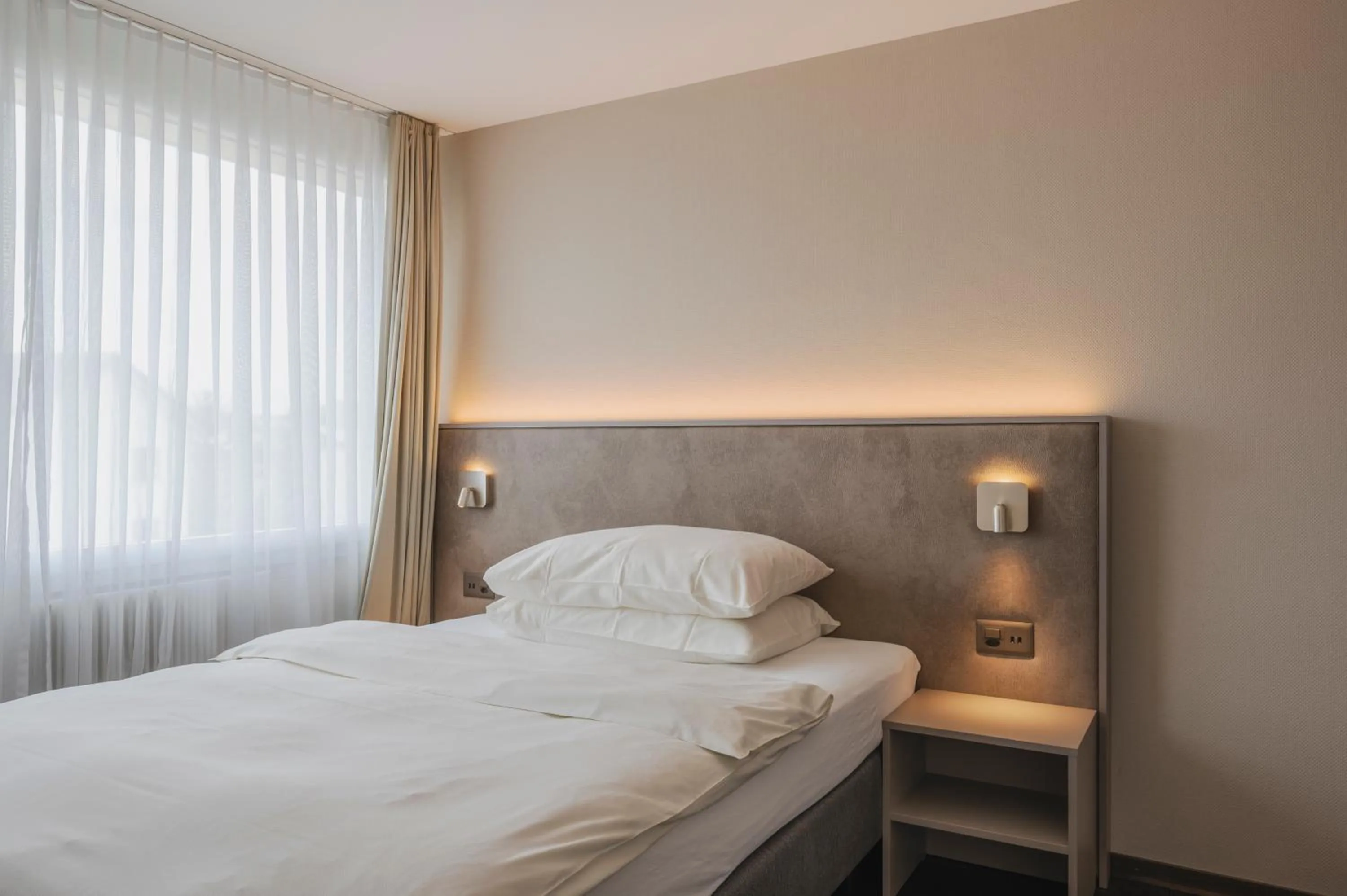 Bed in Amanthos Living Zürich Airport