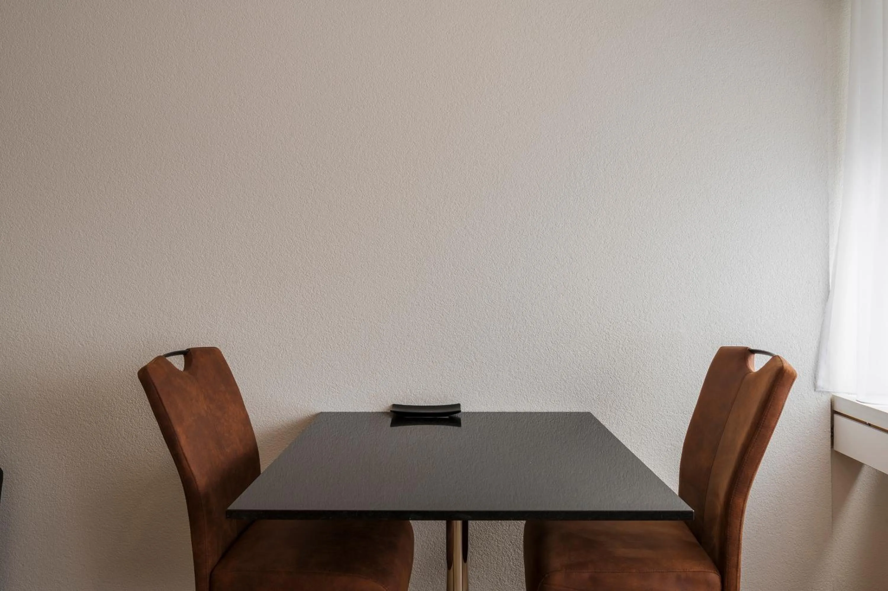 Dining area in Amanthos Living Solothurn