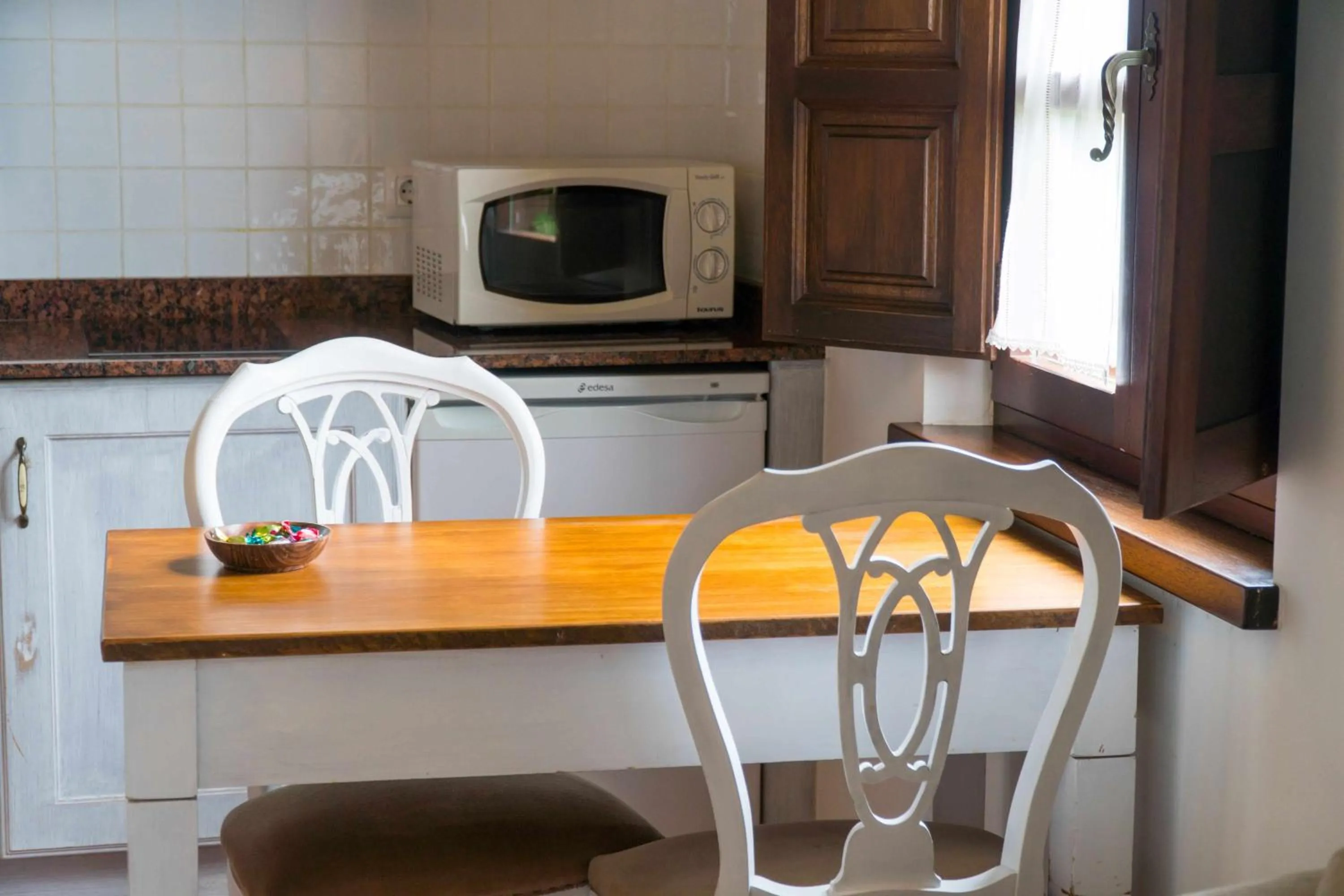 Kitchen or kitchenette in Apartamentos Arcadia