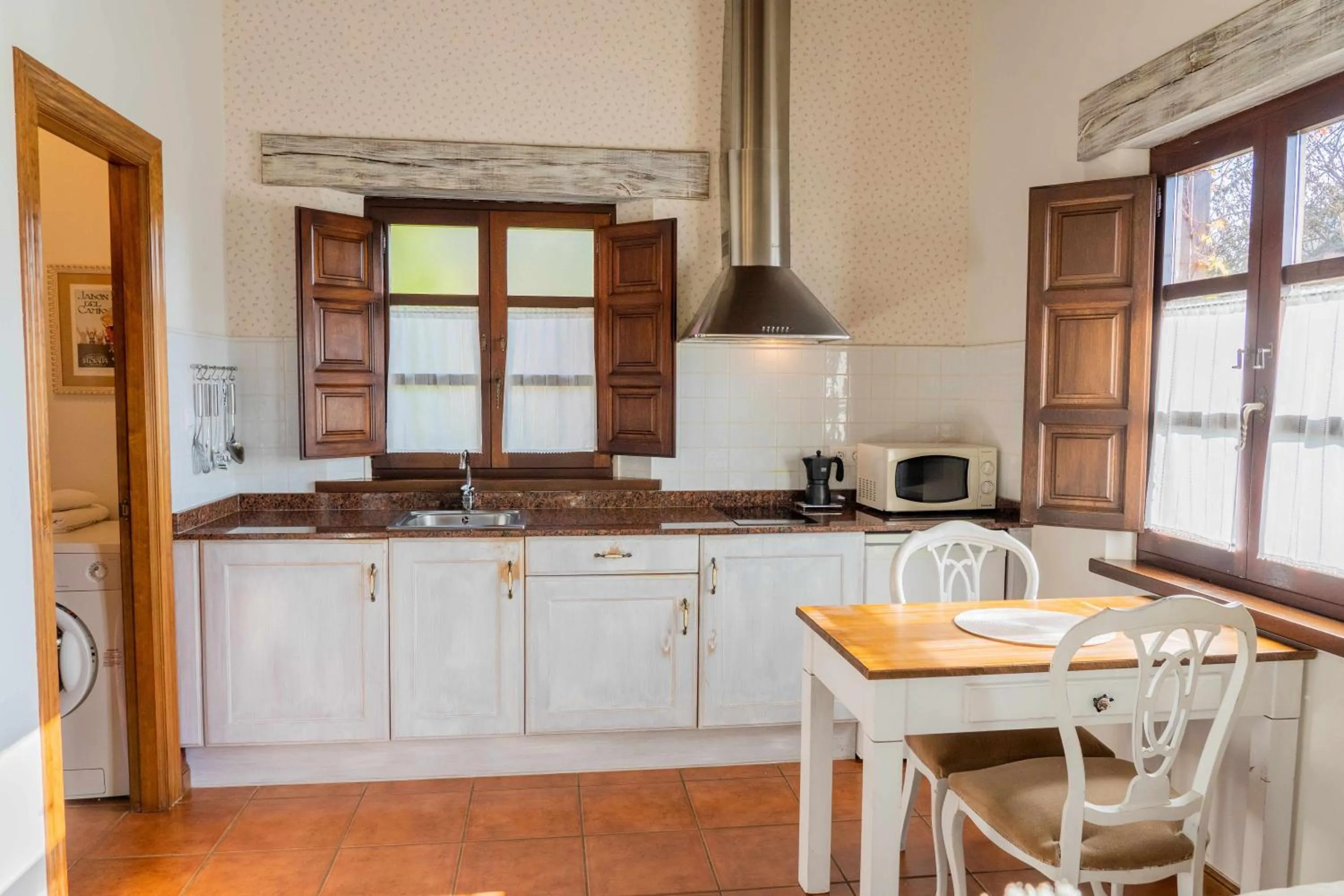 Kitchen or kitchenette in Apartamentos Arcadia