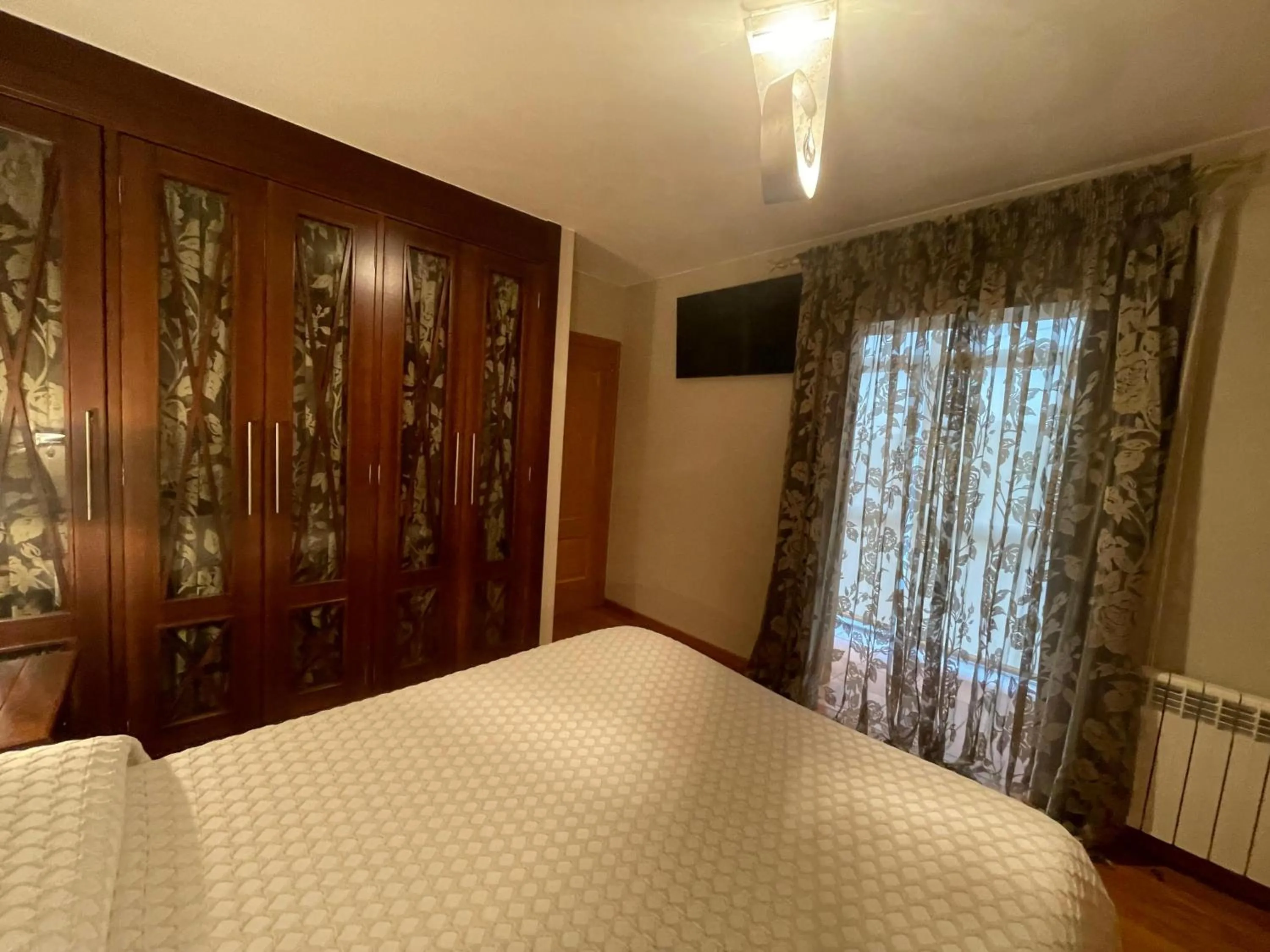 Bedroom, Bed in Apartamentos Río Sil