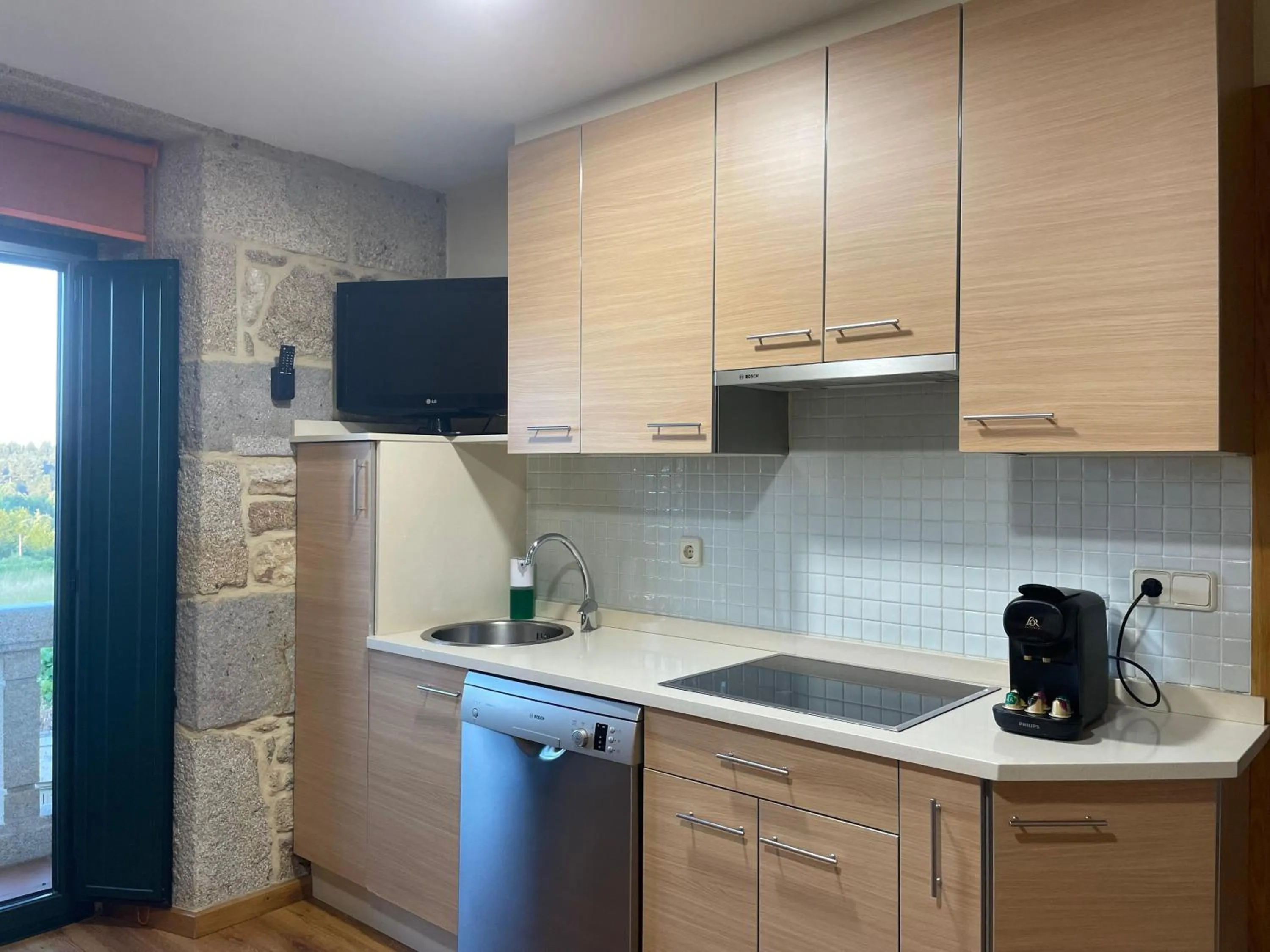 kitchen in Apartamentos Río Sil