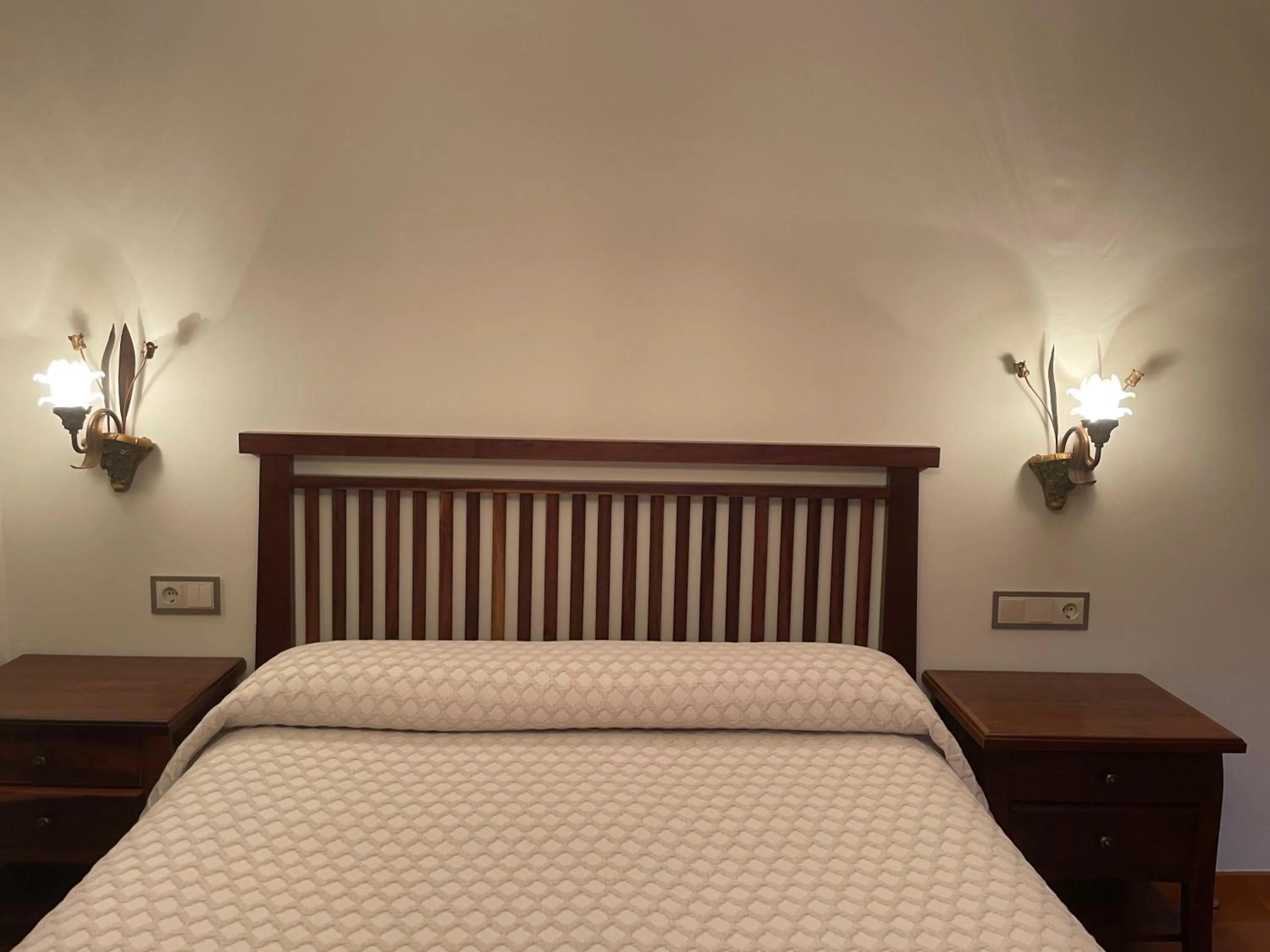 Bed in Apartamentos Río Sil