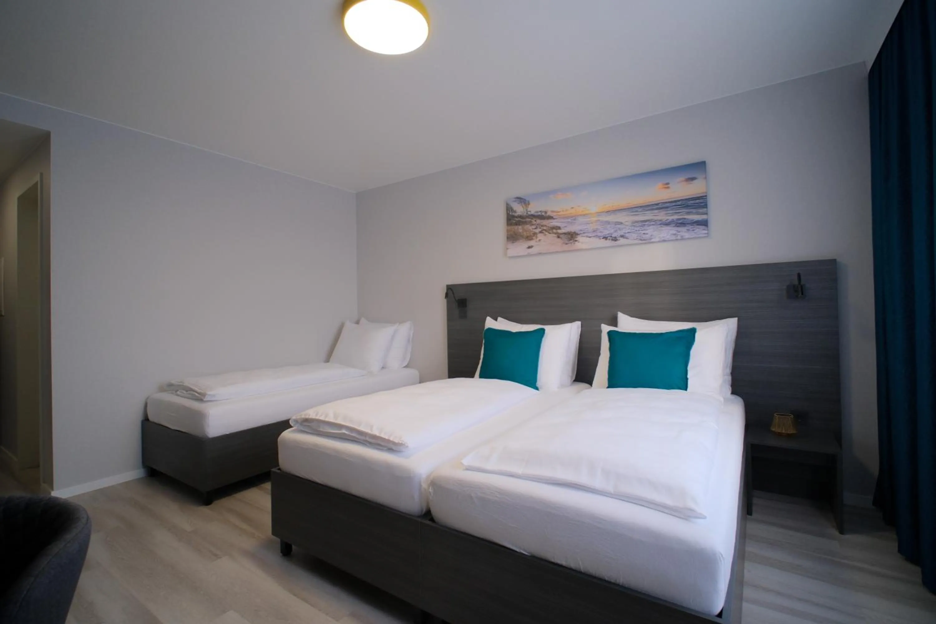 Bed in Hotel Kiel by MELIO