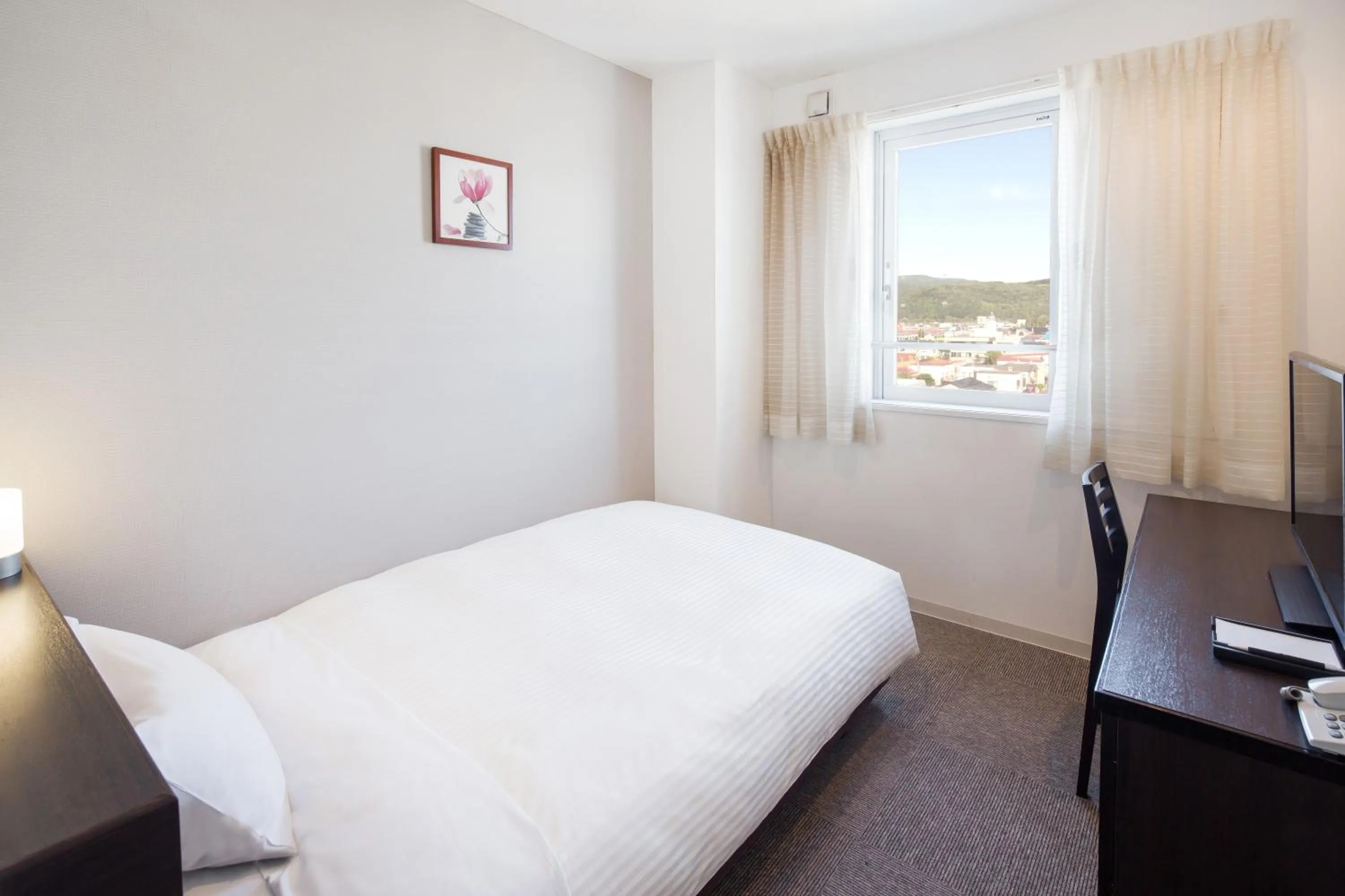 Photo of the whole room, Bed in Hotel Mystays Nayoro