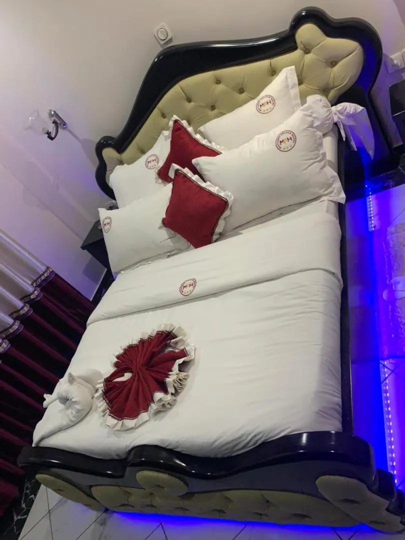 Bed in Matcheu Palace Hôtel