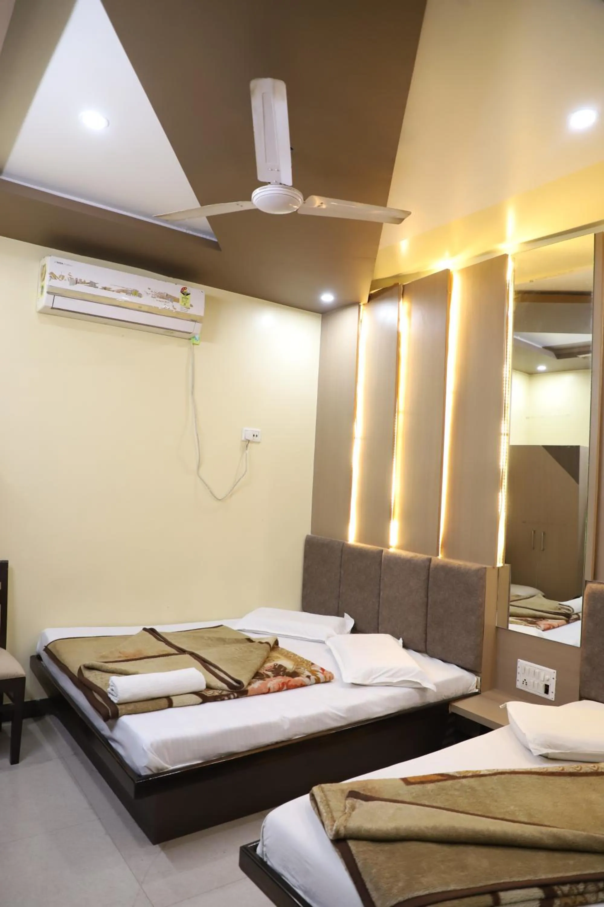 Bed in Hotel Mittal Inn