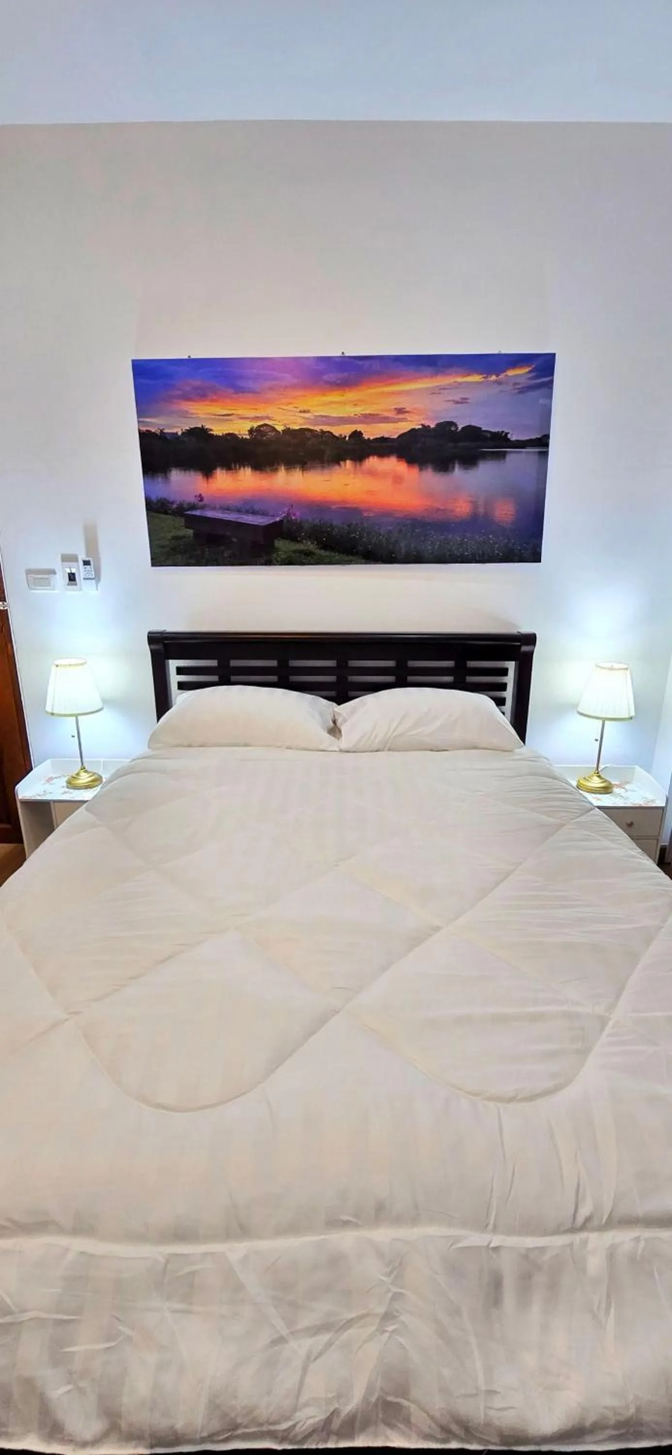 Bed in Tiny Island Lake Lodge
