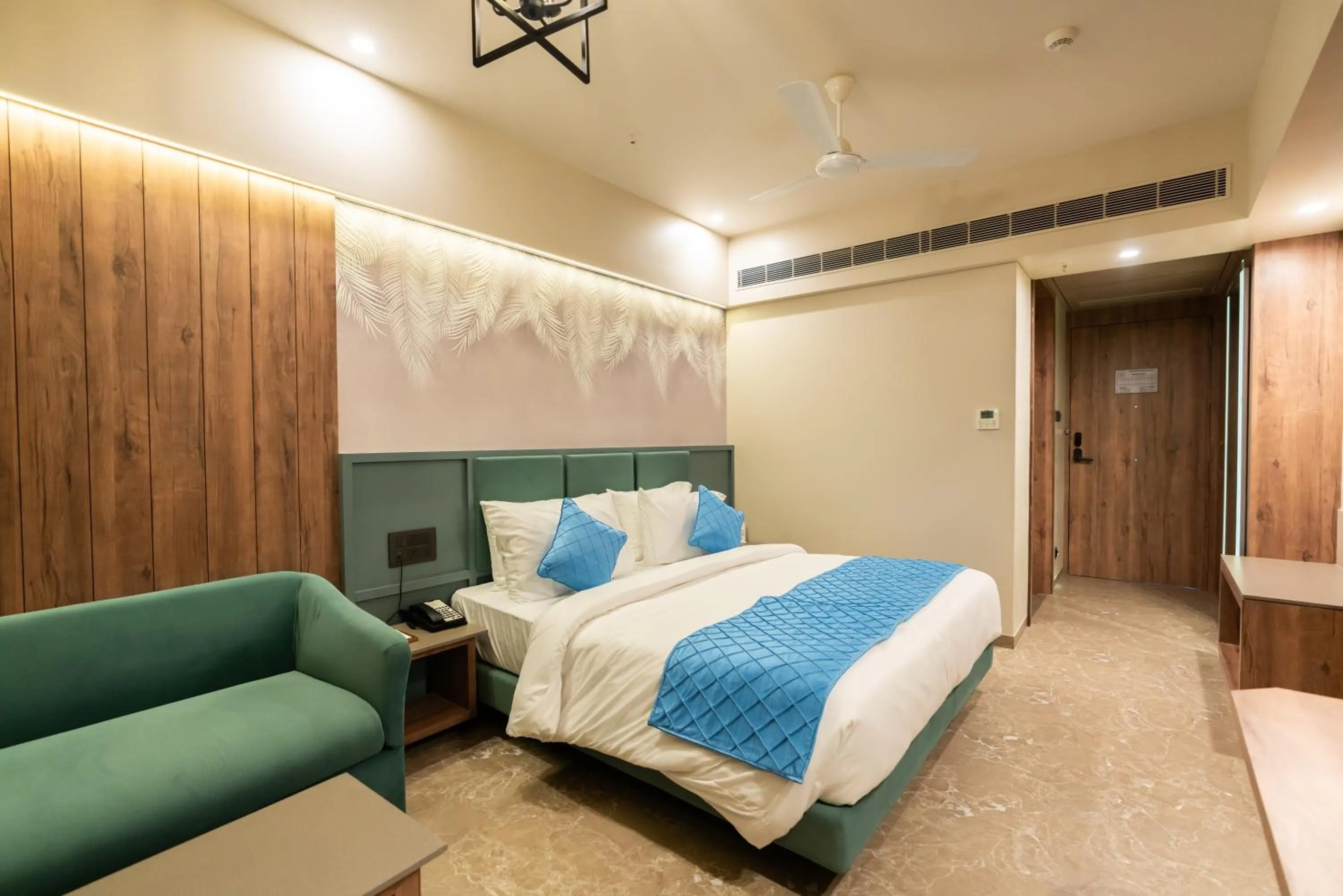 Bed in The Fern Residency, Porbandar