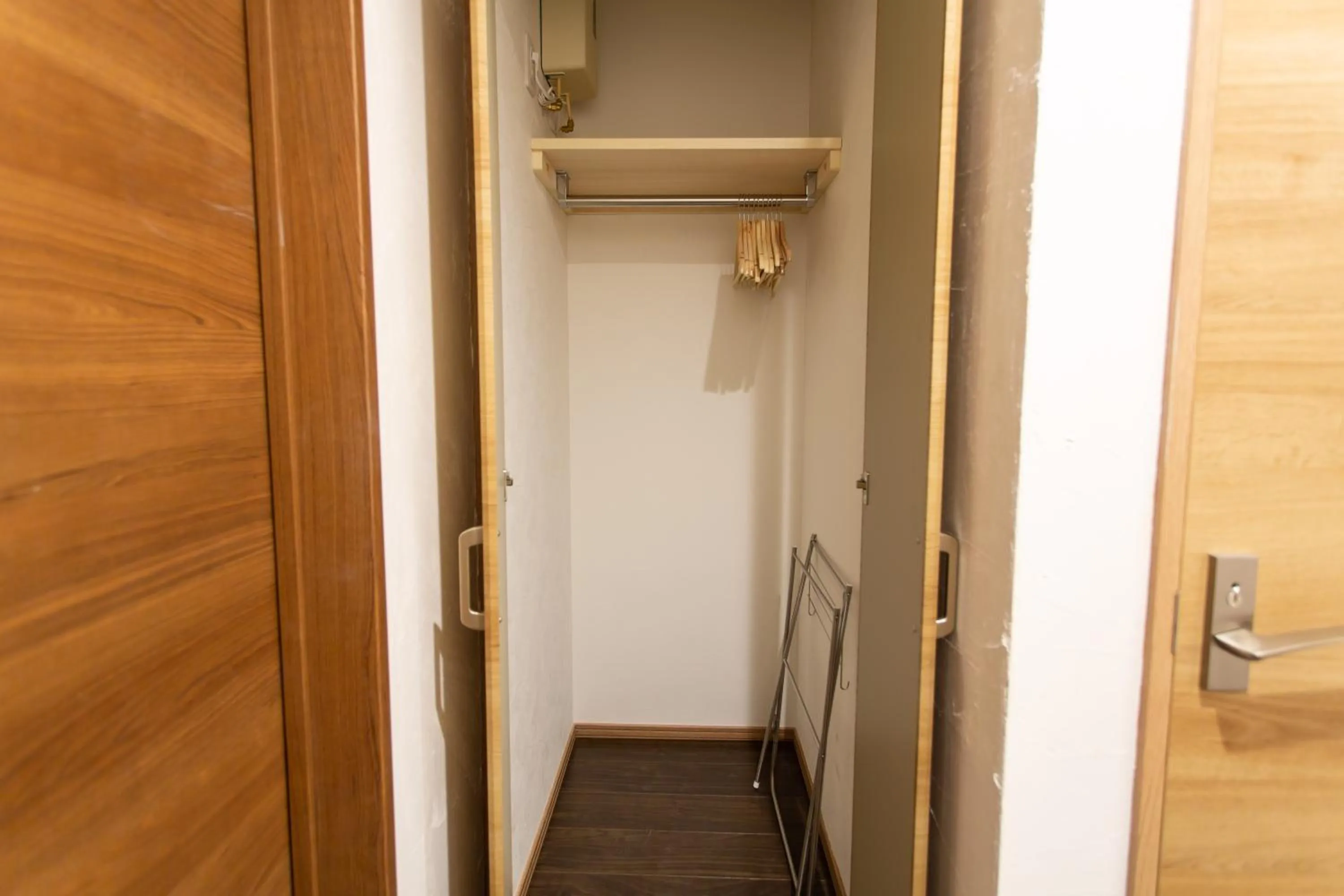 wardrobe in The Apartment Hotels YAMA