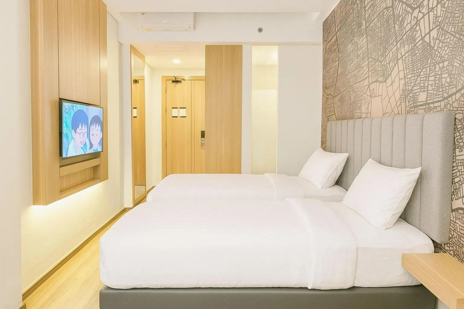 Bed in QNZ Hotel Jakarta