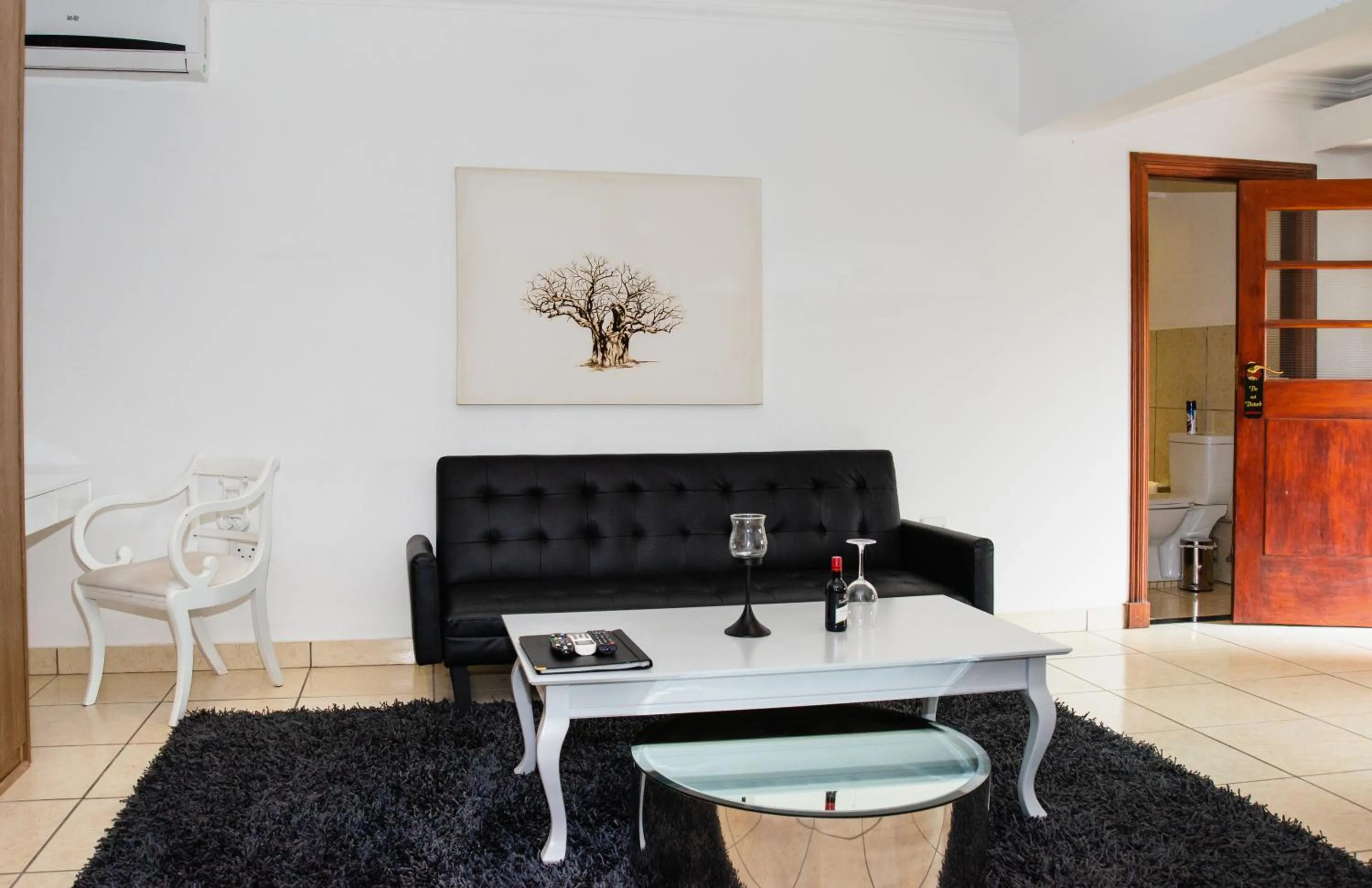 Seating area in Gardenia Boutique Hotel