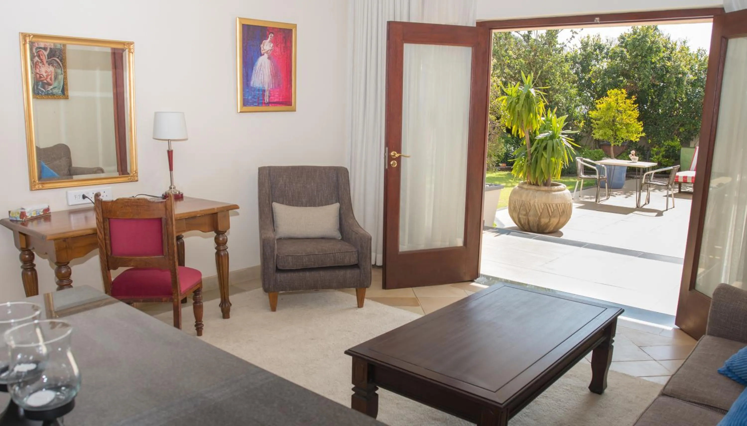 Seating area in Gardenia Boutique Hotel