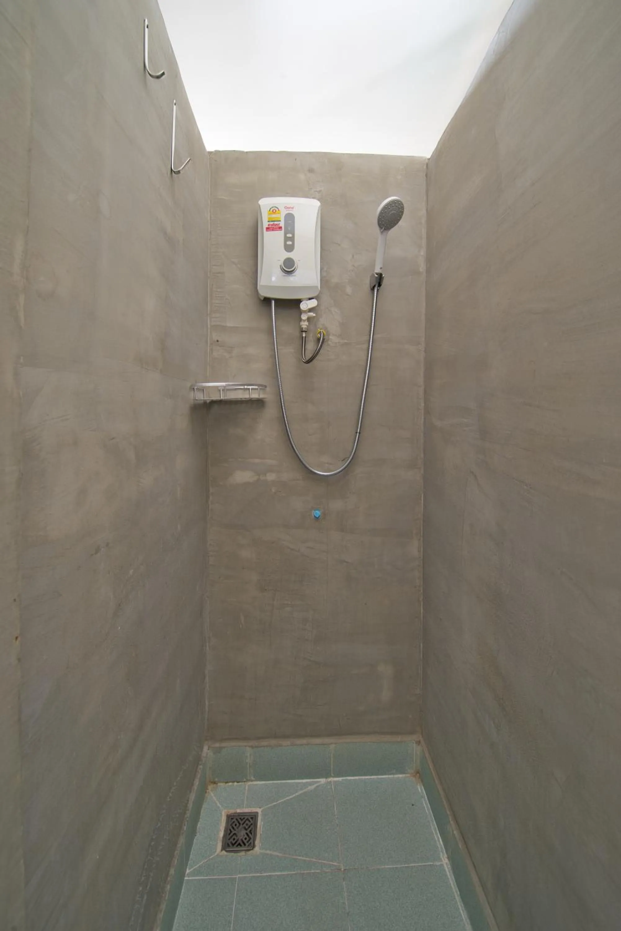 Shower in Kalinga Art Home Guest House