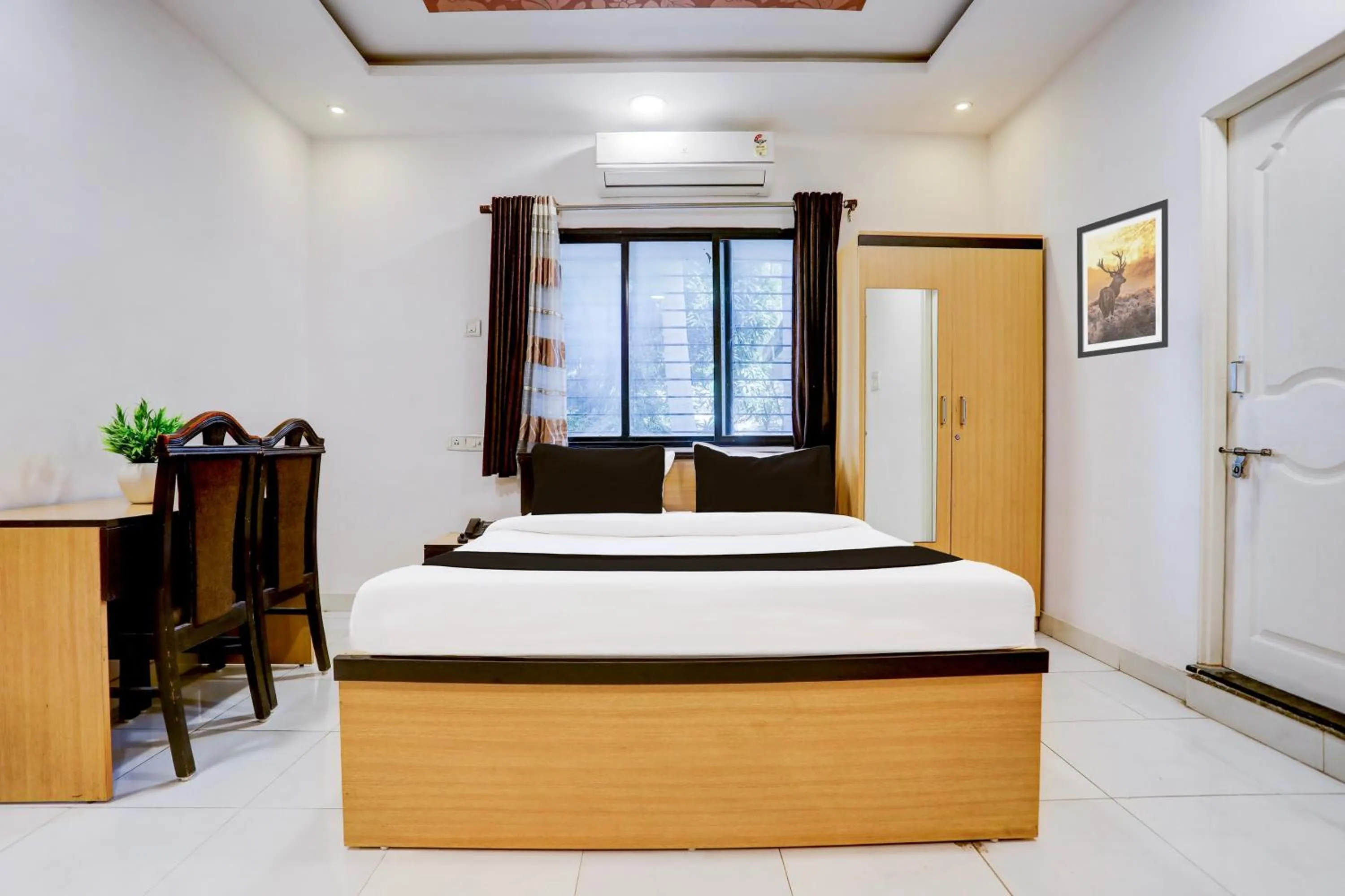 Bedroom in Hotel O GREEN PALMS