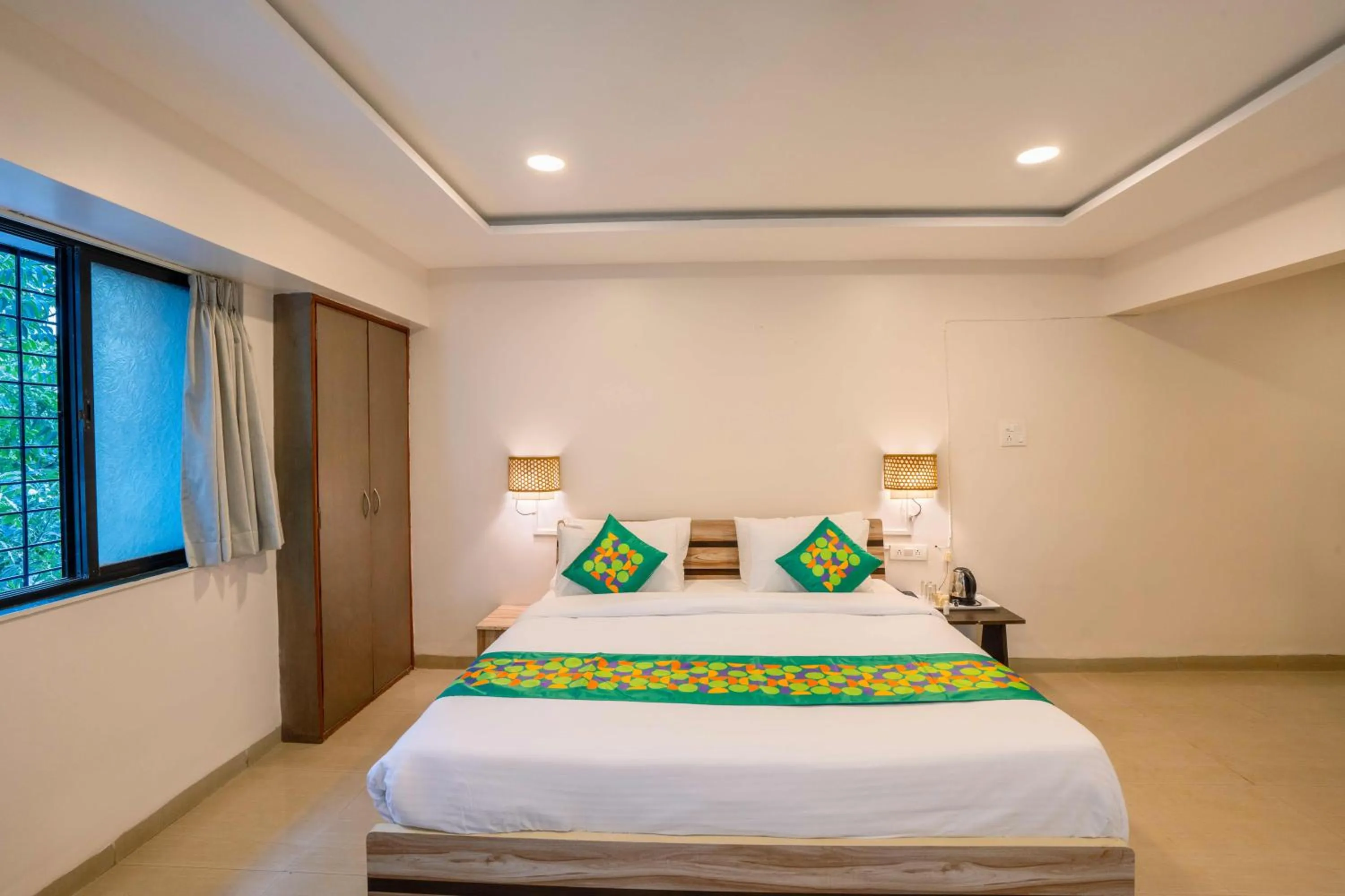 Bedroom, Bed in Treebo Royal Comfort Atithi