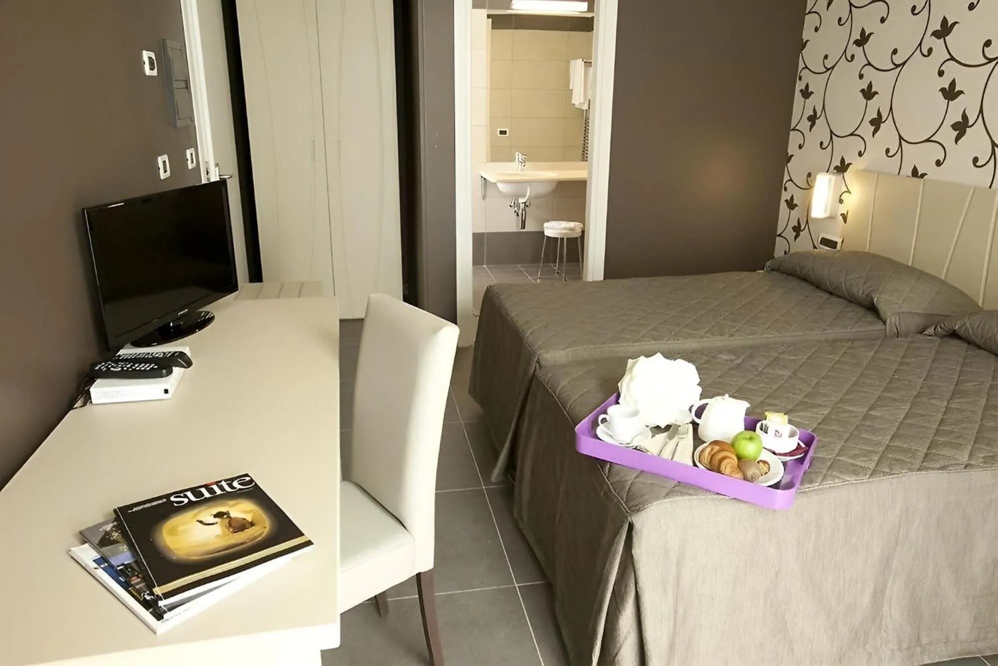 Bed in Sunrise Hotel