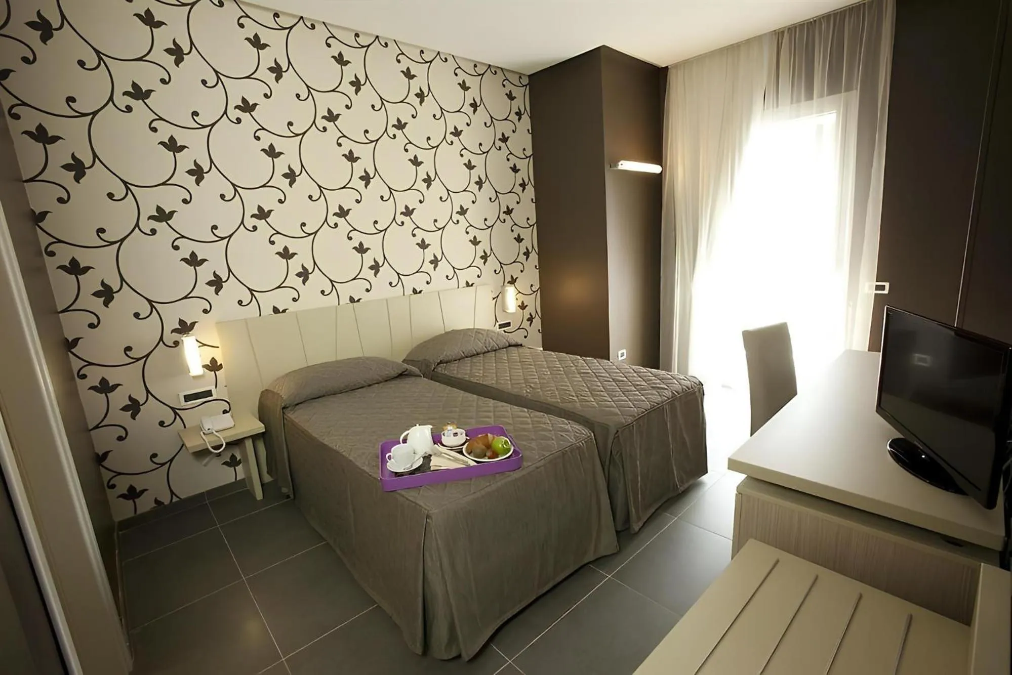 Bed in Sunrise Hotel