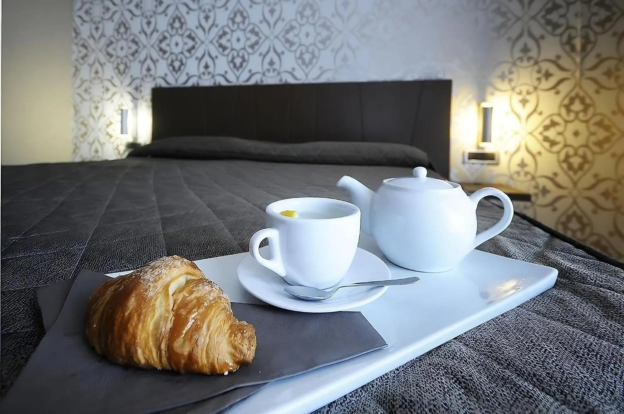 Bed in Sunrise Hotel