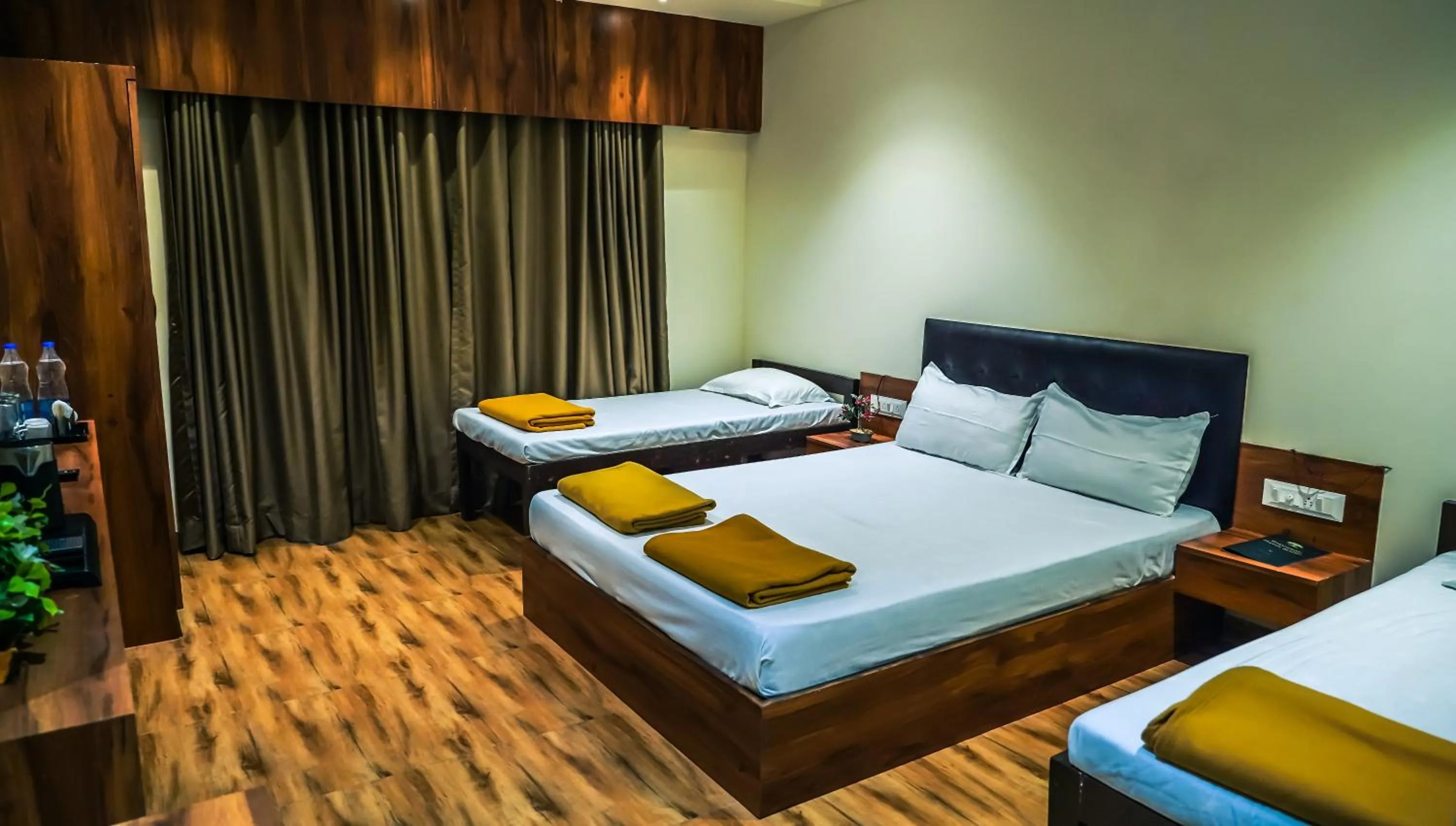 Bed in Whispering Peepul Resort