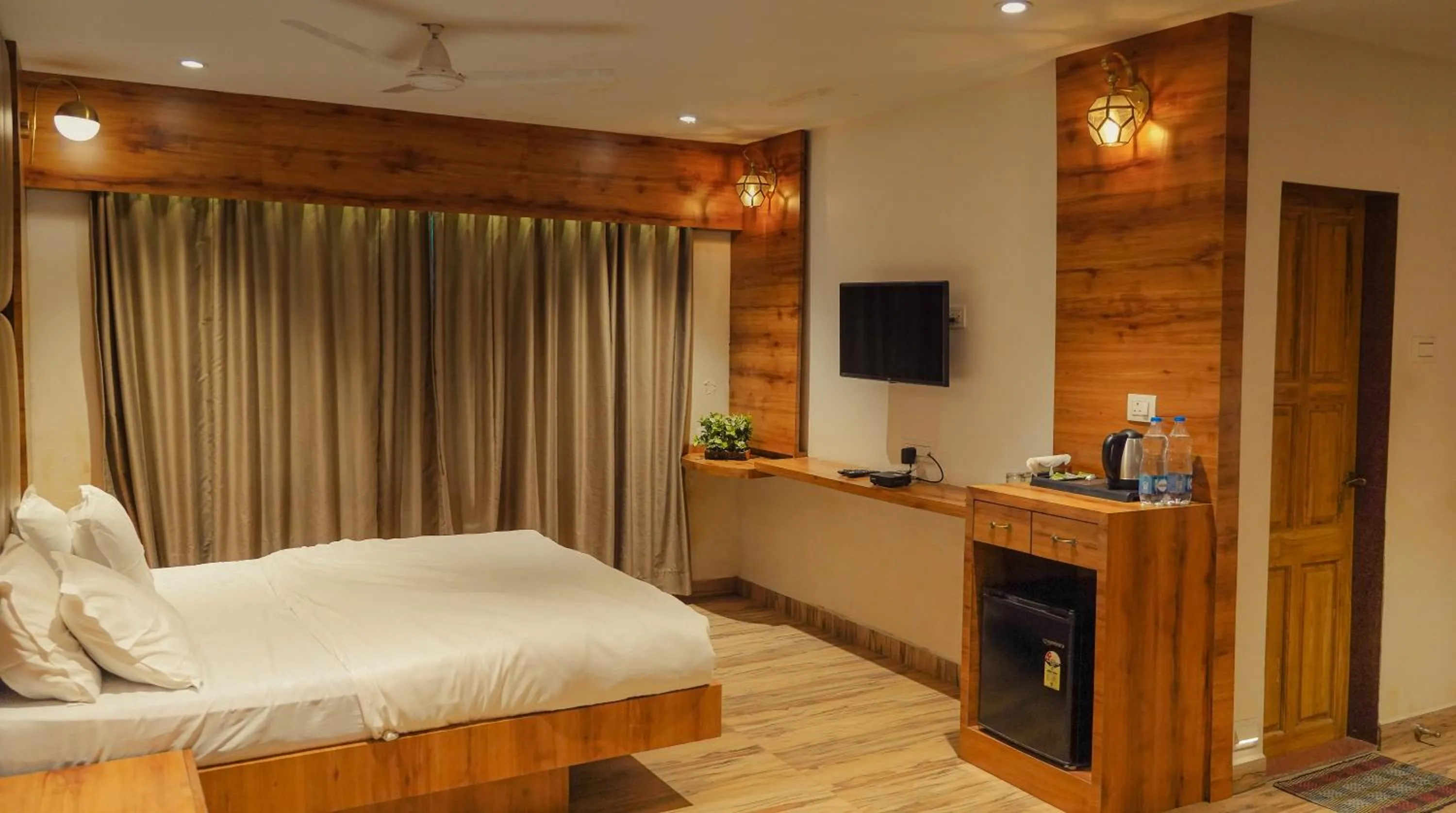 Bed in Whispering Peepul Resort