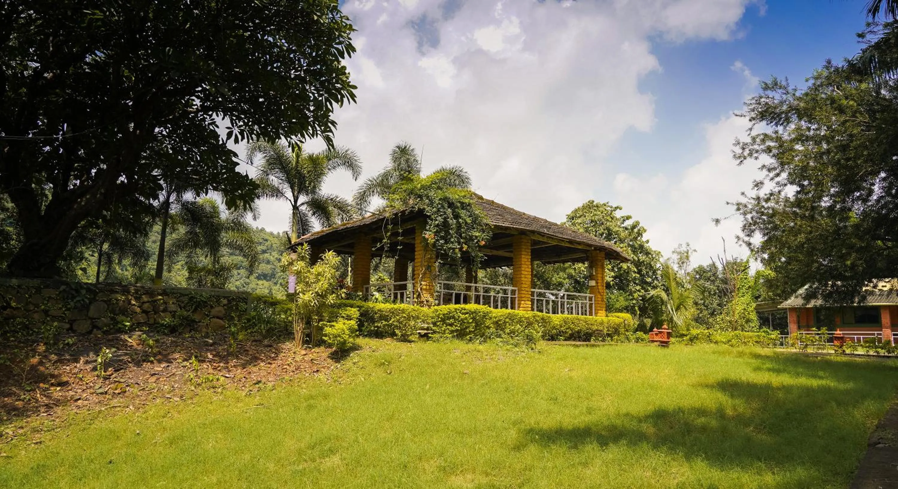 Property building in Whispering Peepul Resort