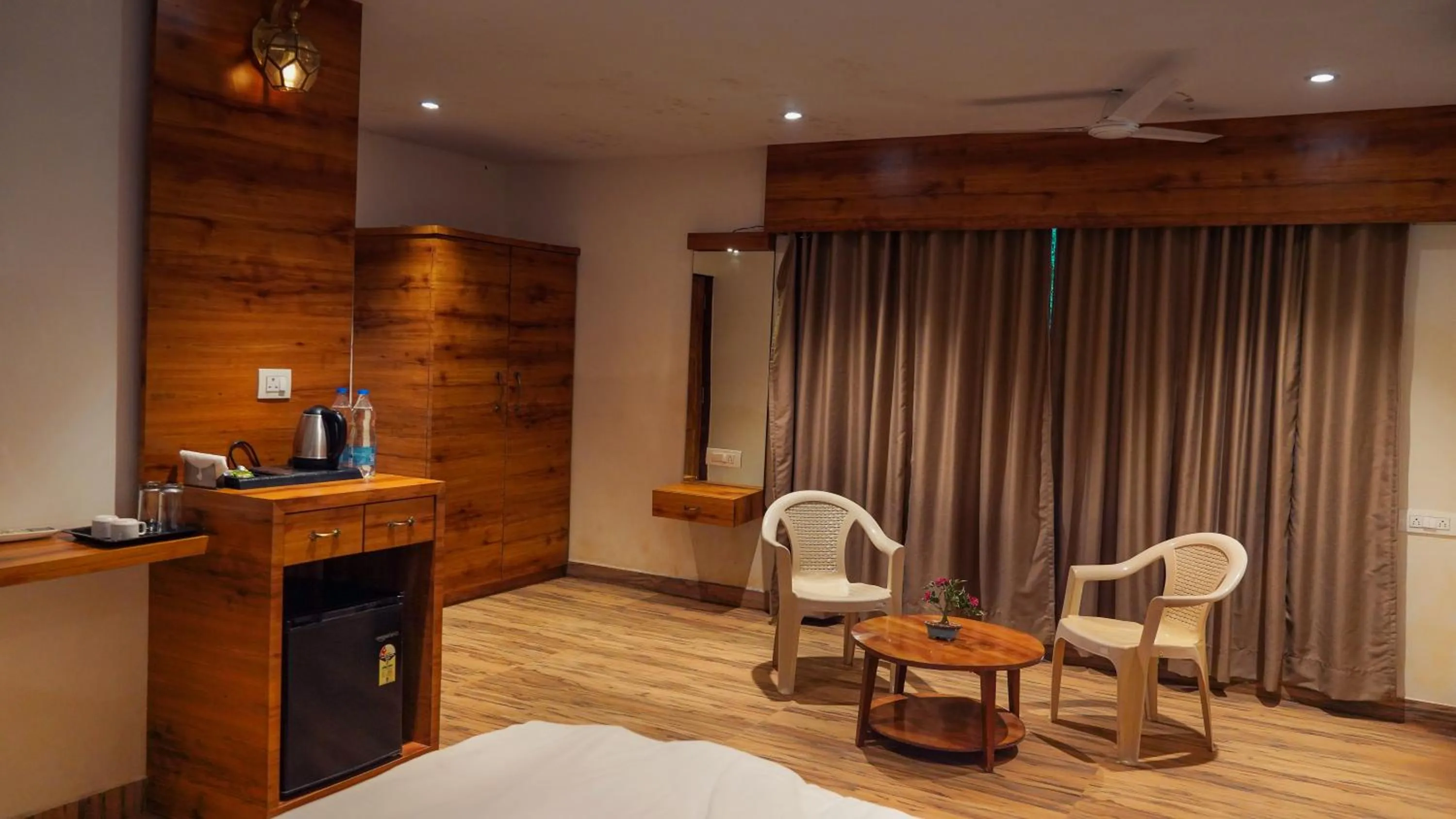 Bed in Whispering Peepul Resort