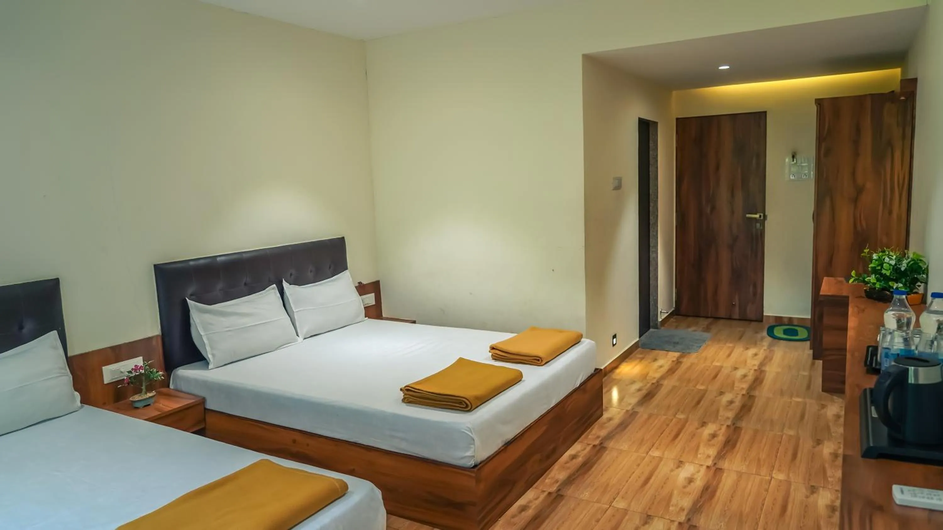 Bed in Whispering Peepul Resort