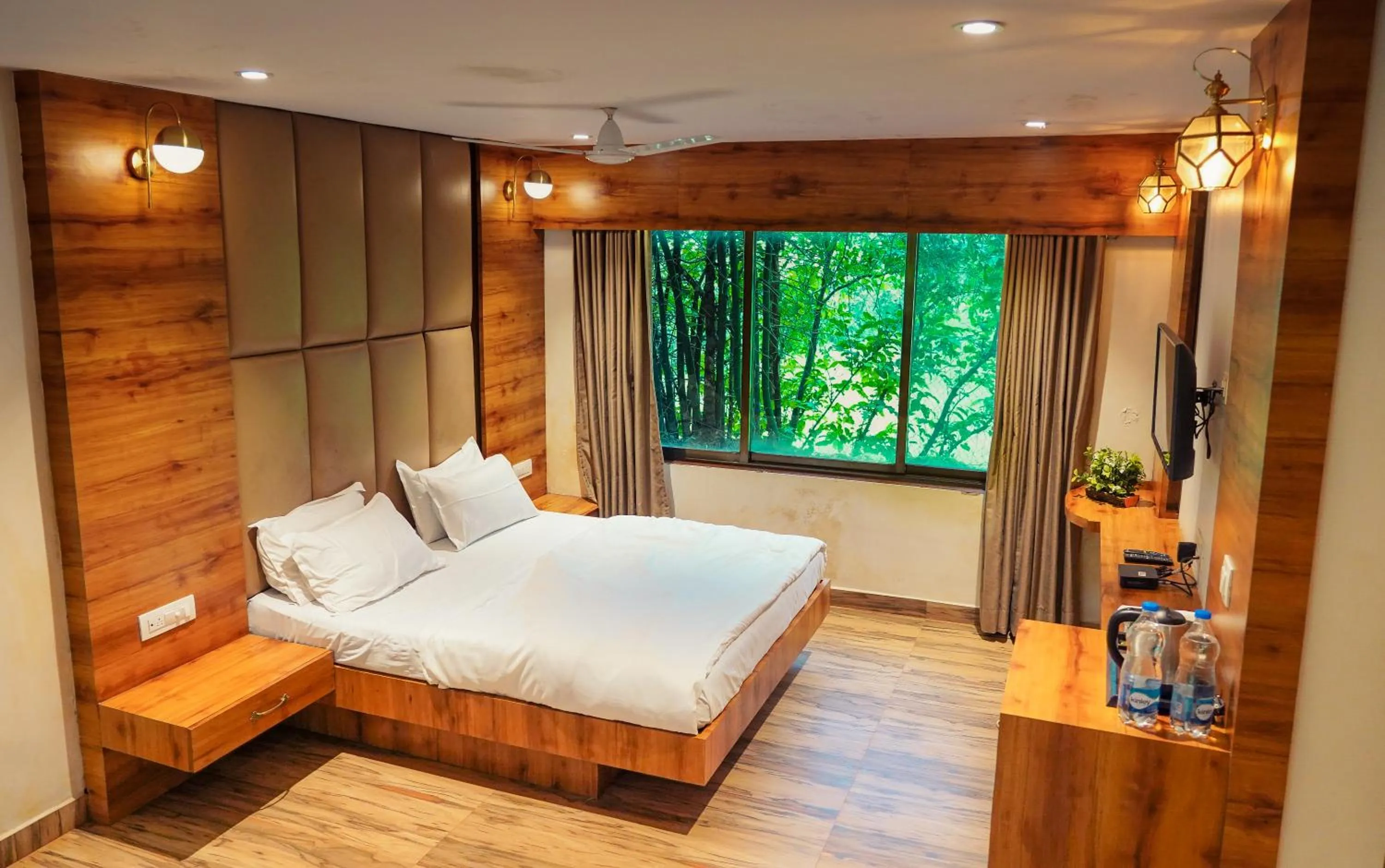 Bed in Whispering Peepul Resort