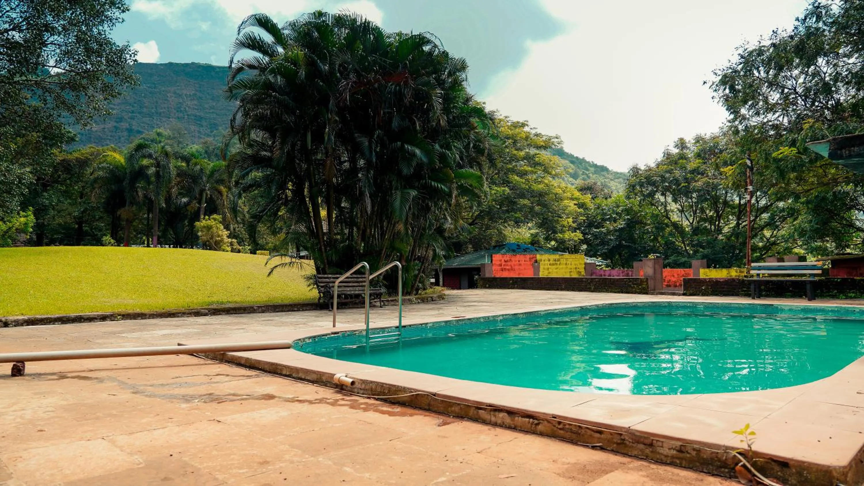Swimming pool in Whispering Peepul Resort