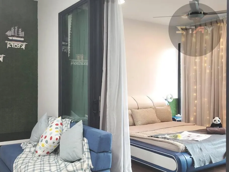 Bed in Almas Suites Cozy King Bed Studio Netflix By STAY