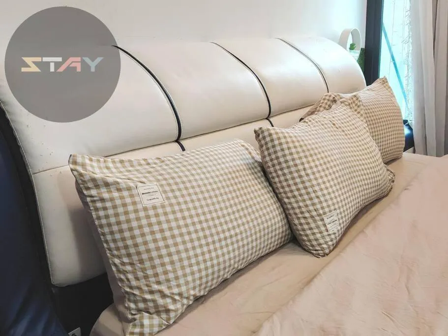 Bed in Almas Suites Cozy King Bed Studio Netflix By STAY