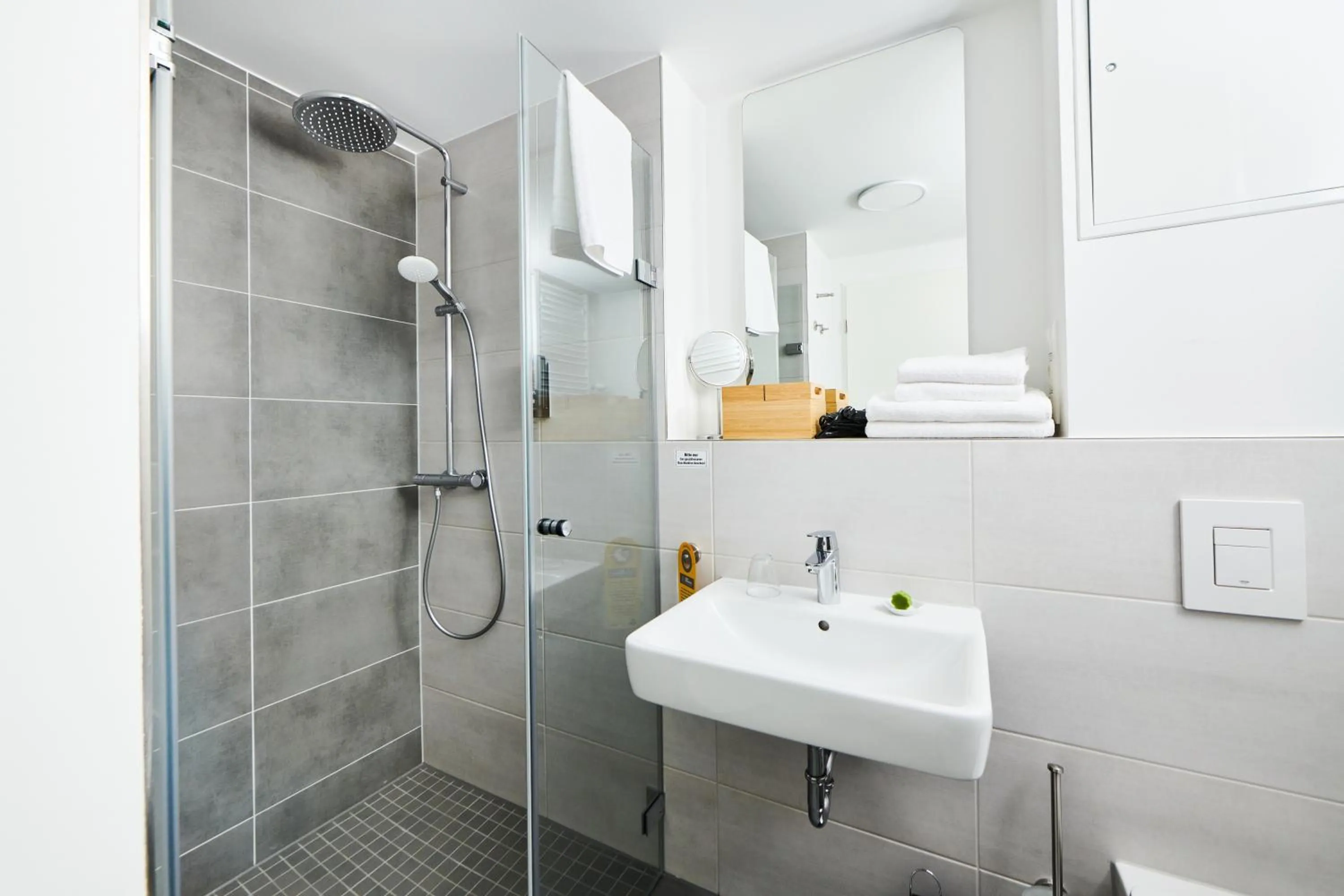 Shower in ADAPT APARTMENT HOTEL Siegen