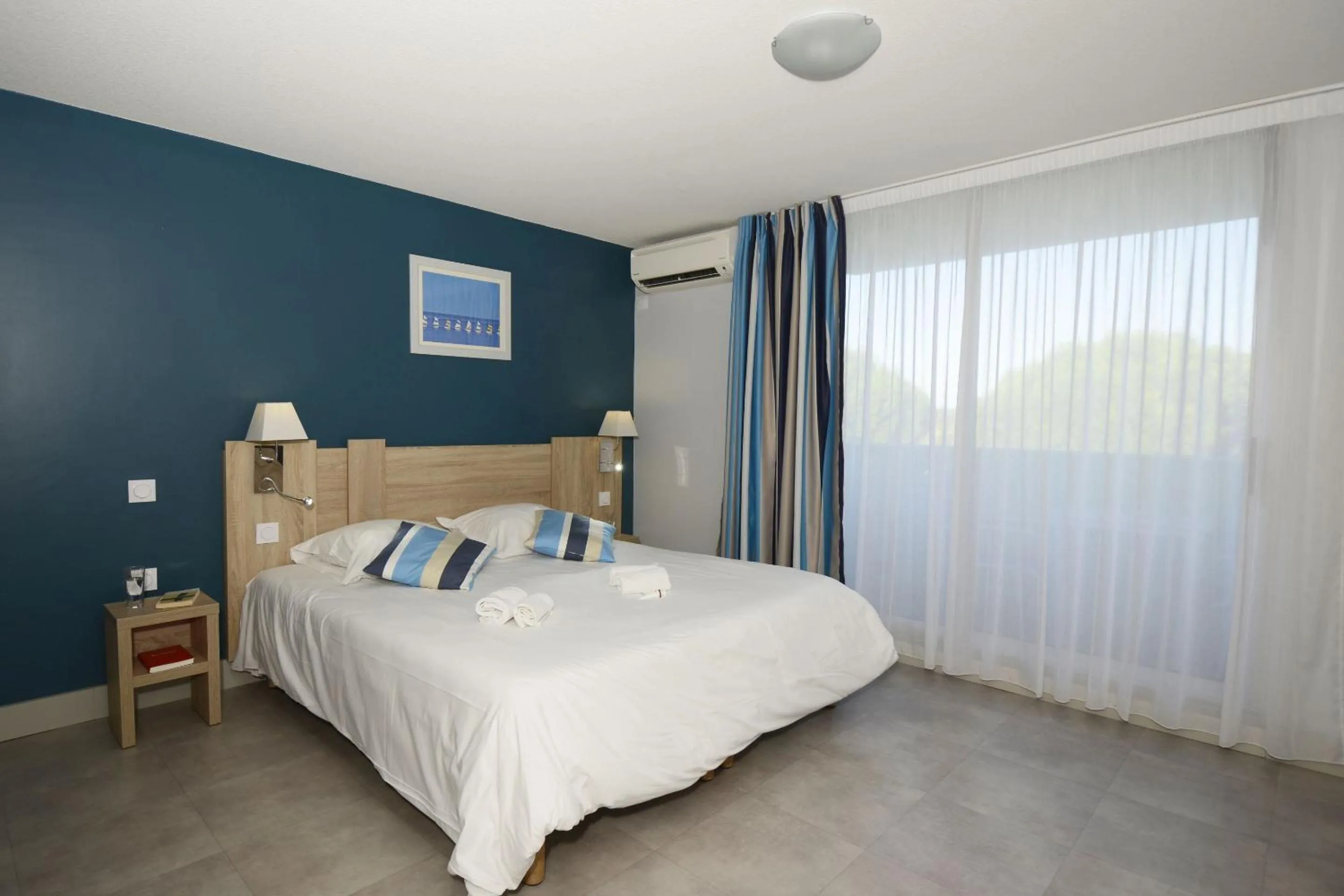 Bedroom, Bed in Résidence Odalys Aqualia