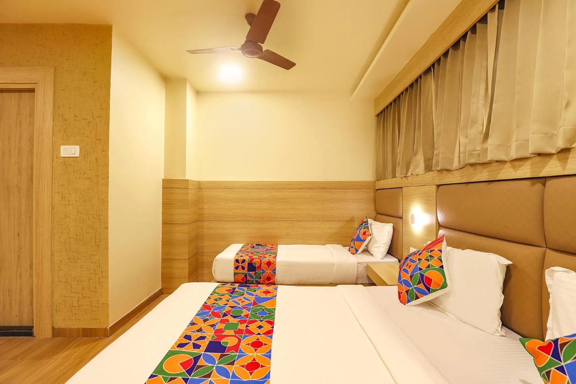 Bed in FabHotel Nestlay Rooms High Court - Nr Parry's Corner