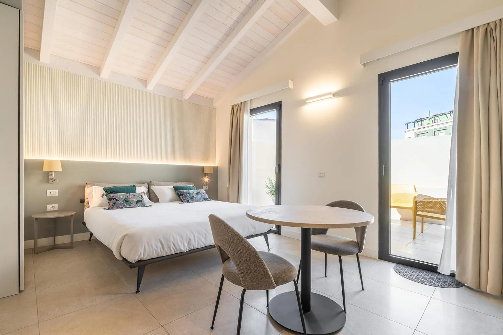 Photo of the whole room, Bed in Karalin Sonnino Suites