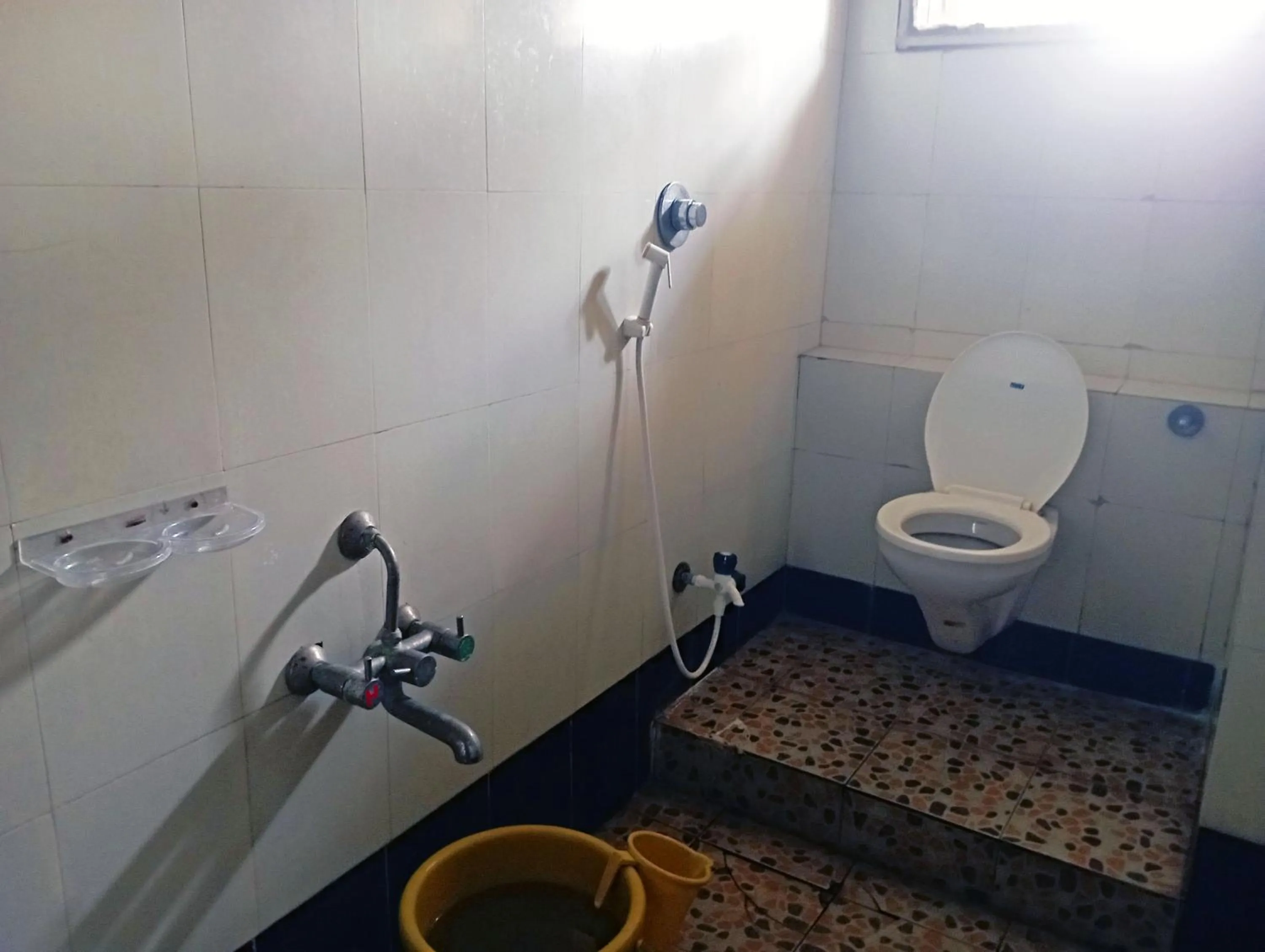 Bathroom in Savanur Deluxe Lodge